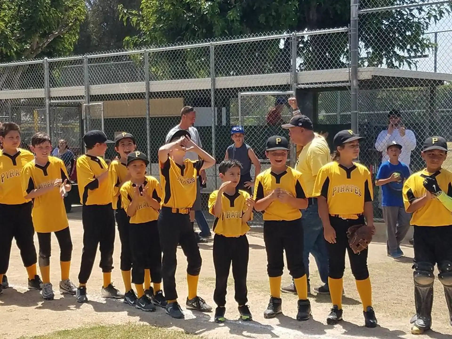 a group of people in yellow shirts