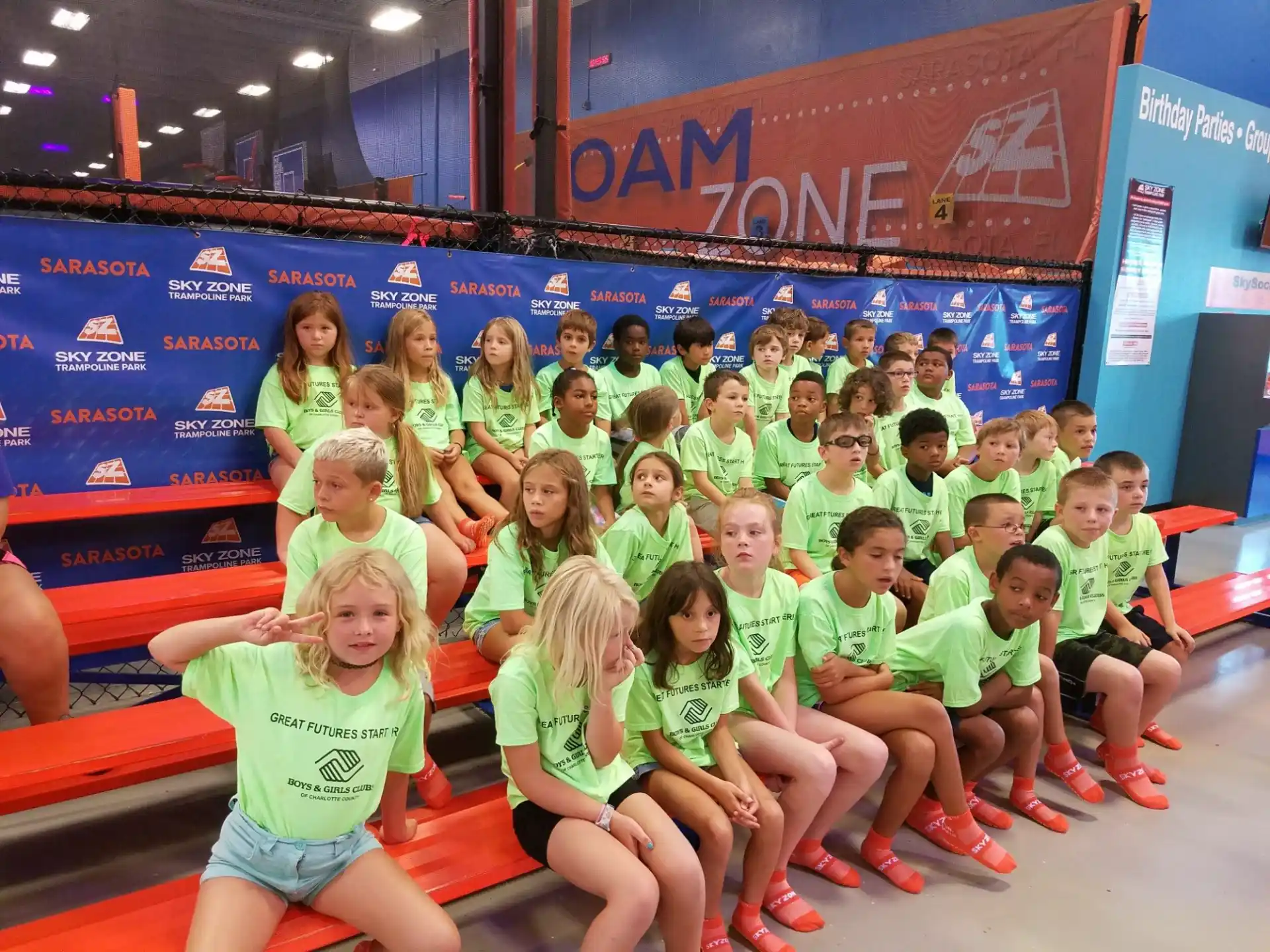 a group of children posing for a photo