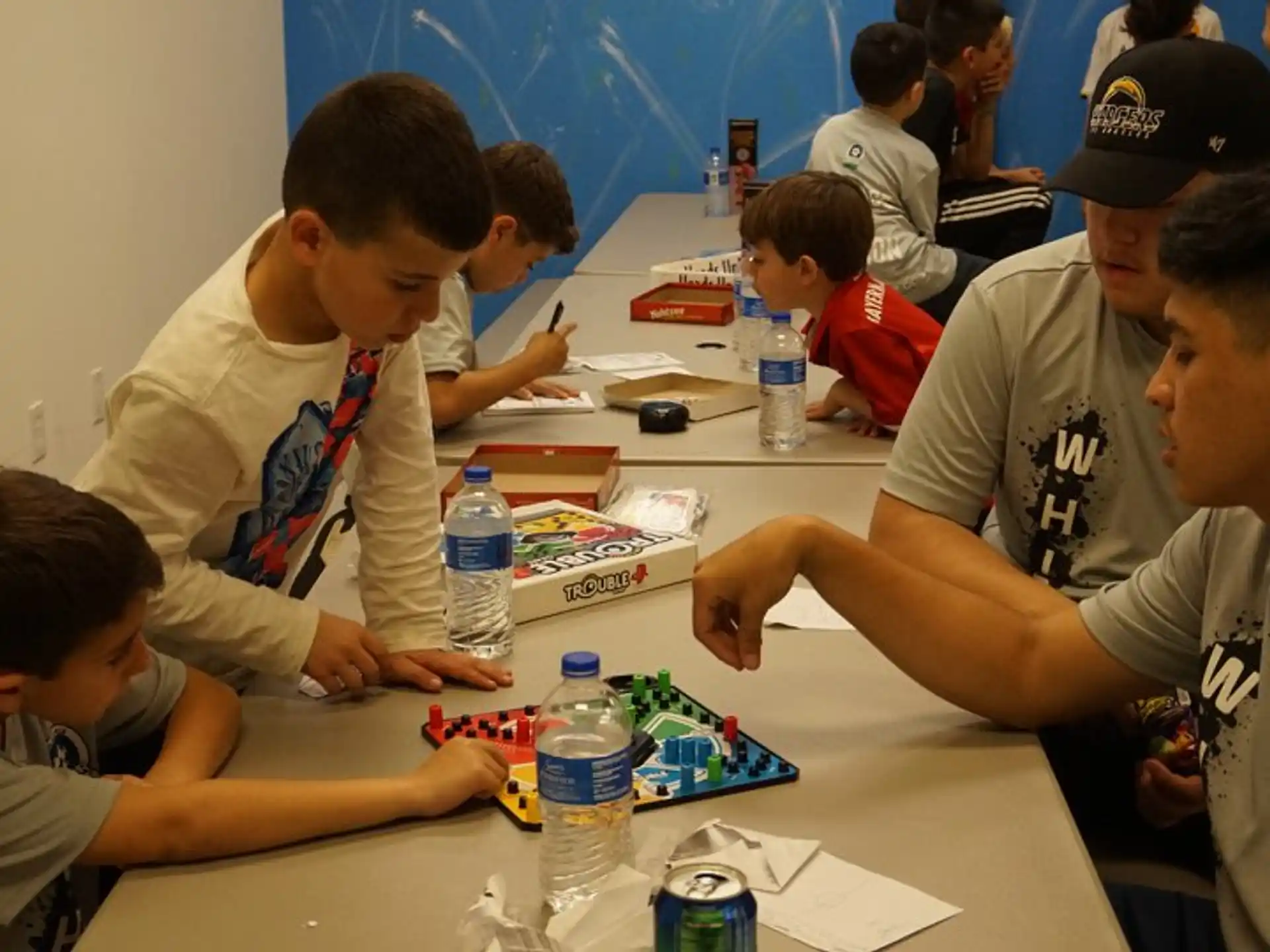 a group of people sitting around a table