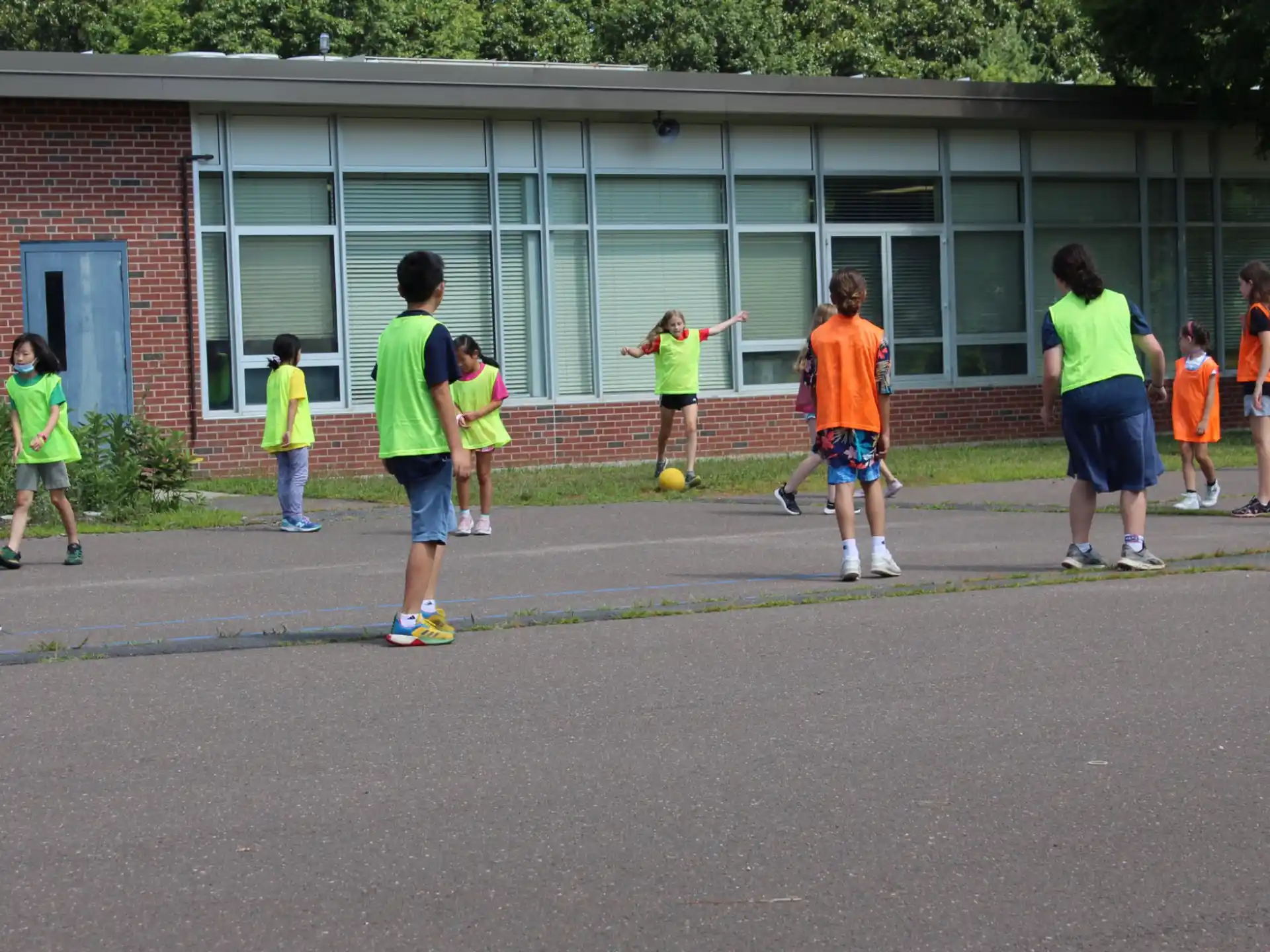 a group of kids playing football