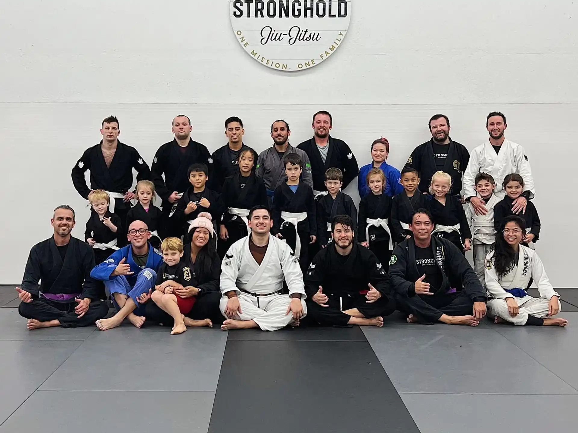 a group of people posing for a photo