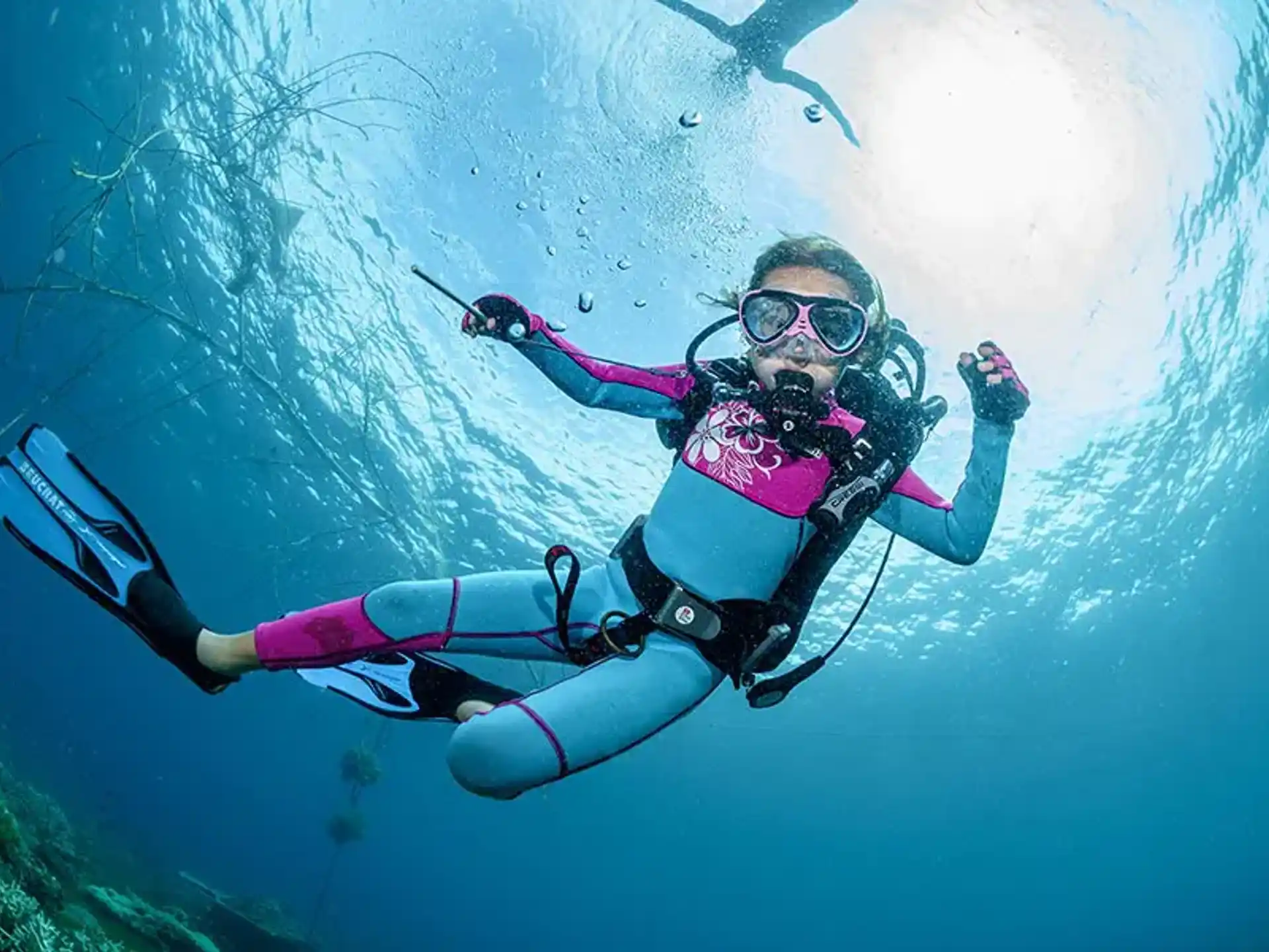 a person in scuba gear underwater
