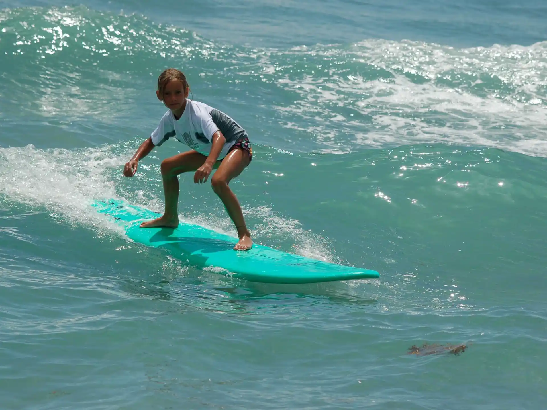 a man surfing on the waves
