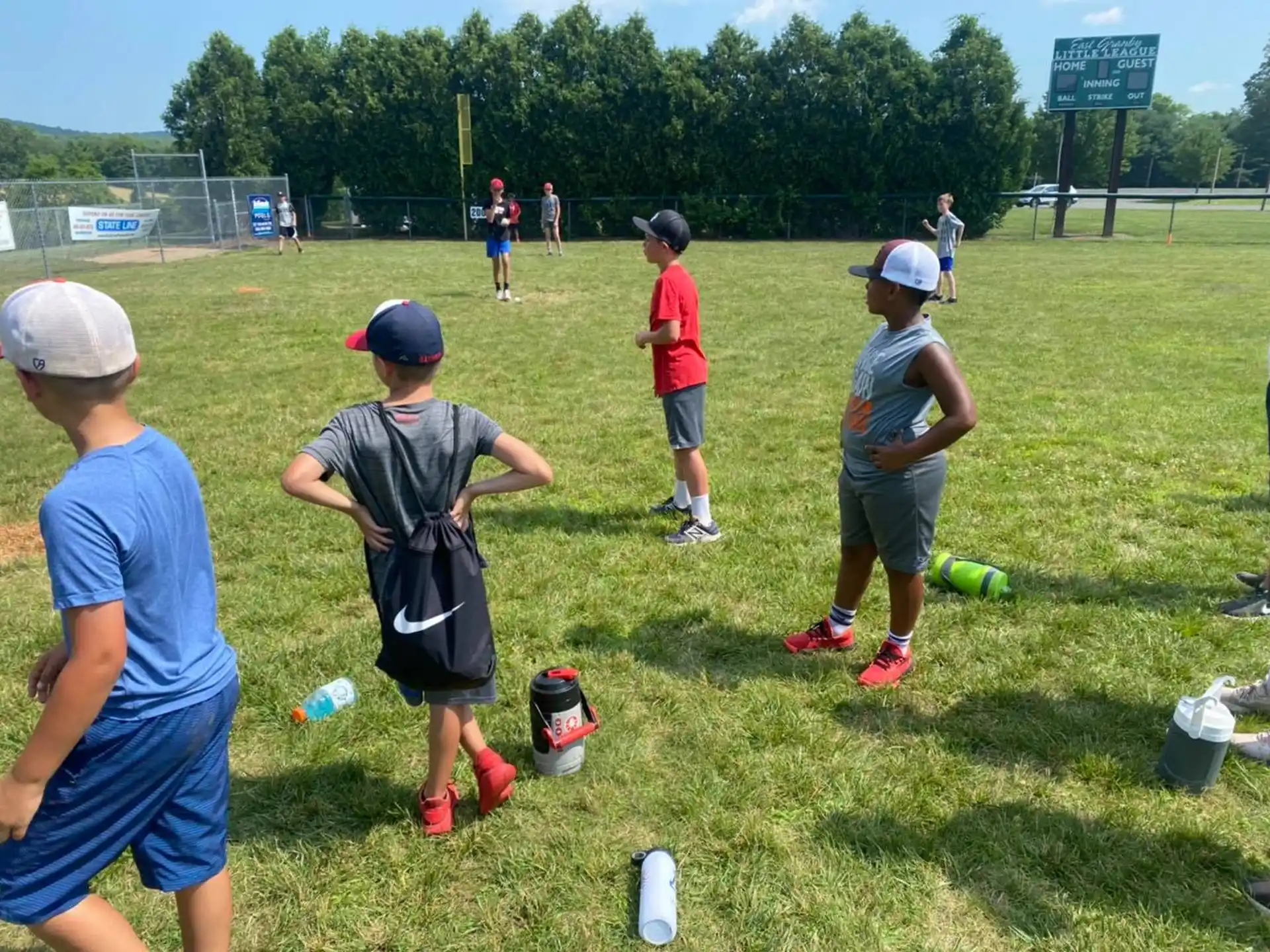 a group of kids playing football