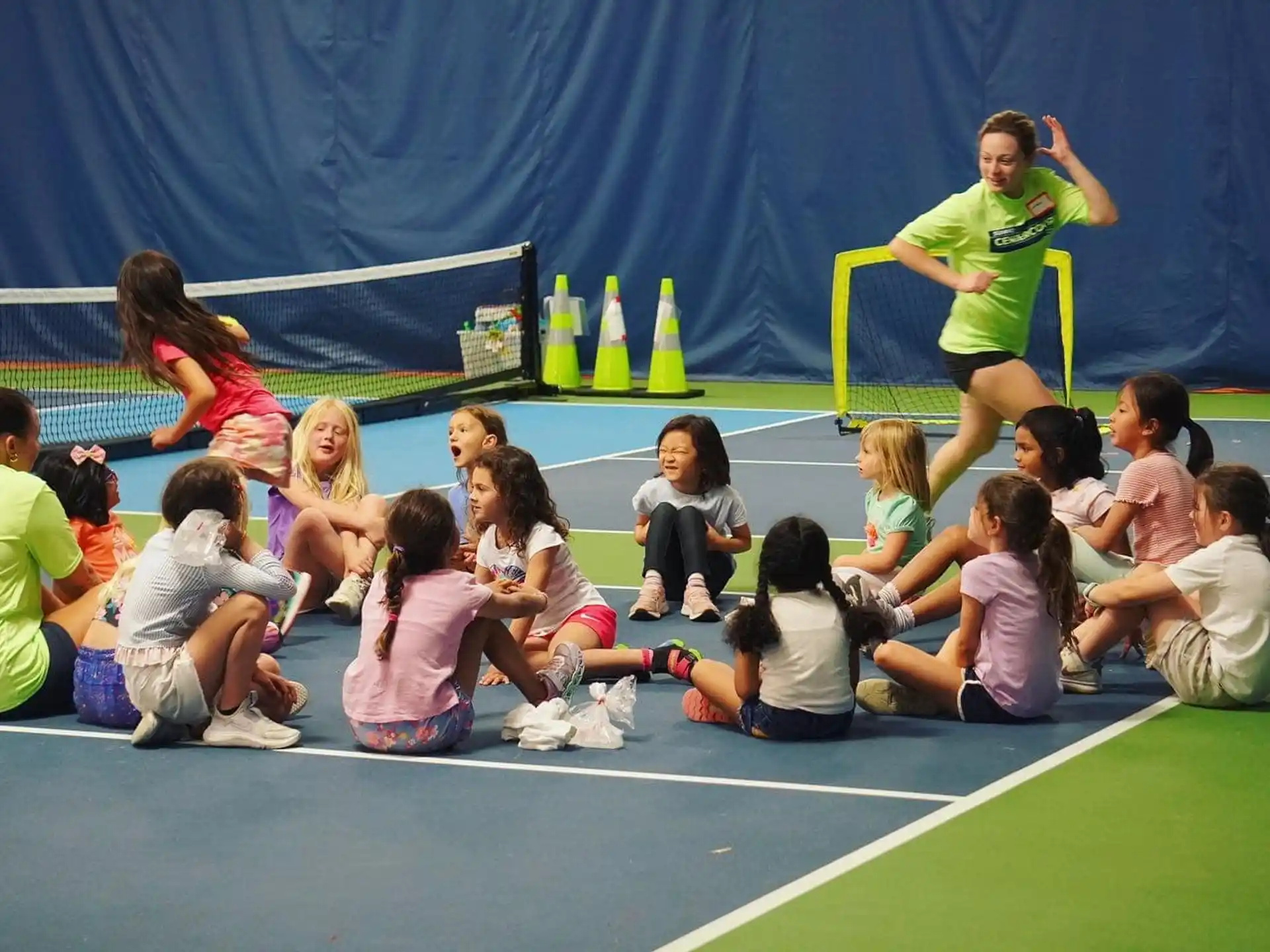 a group of people sitting on the ground
