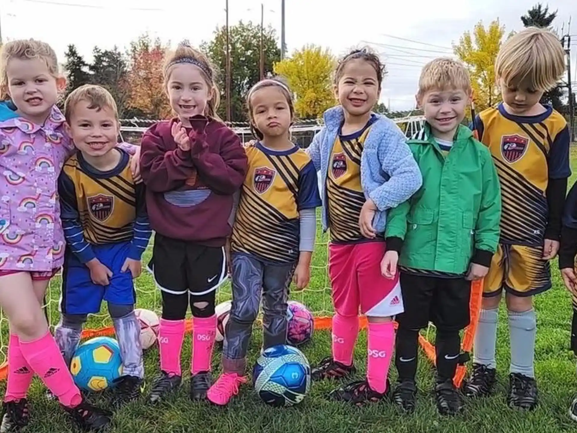 a group of children posing for a photo