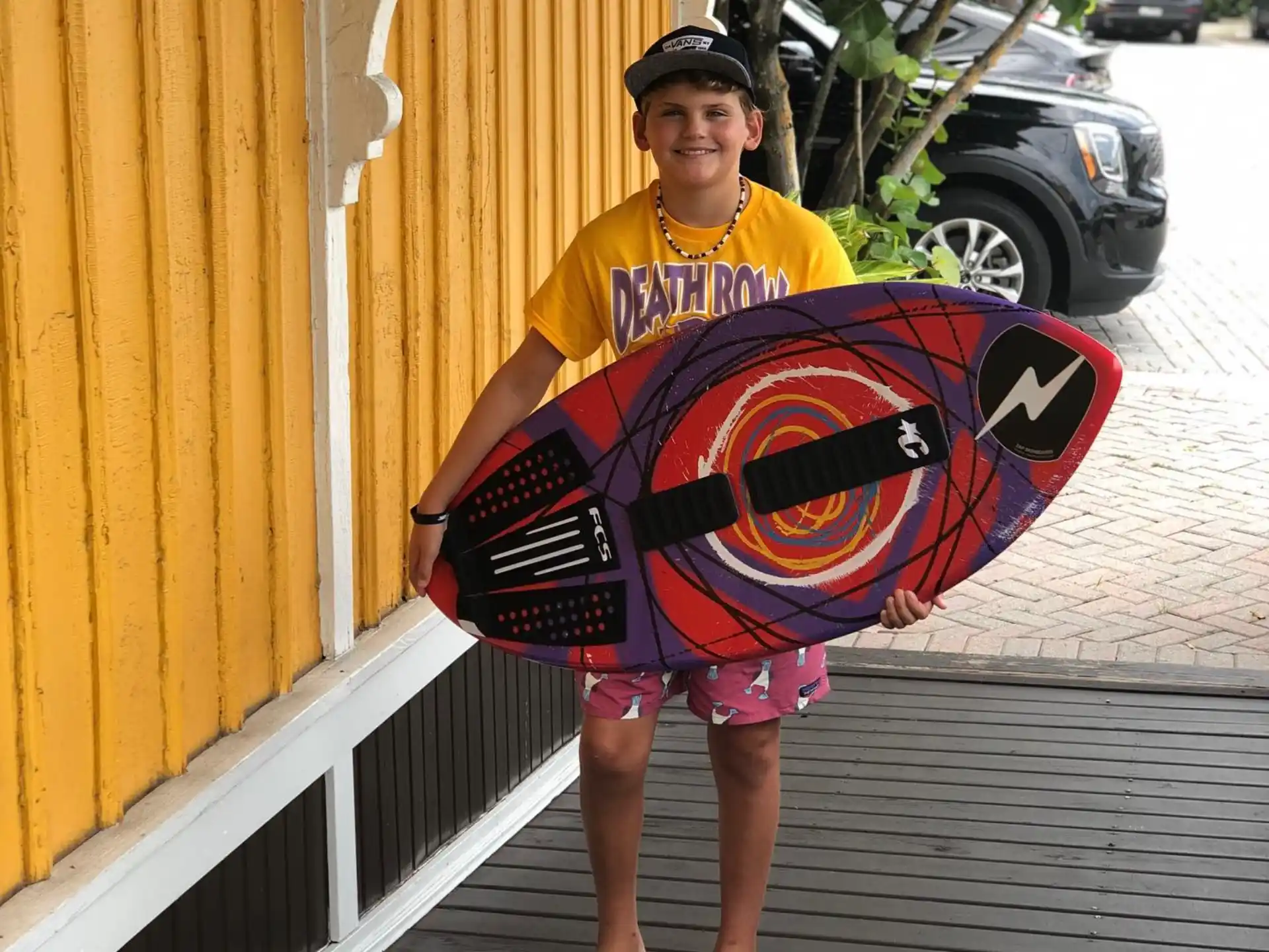 a person holding a surfboard