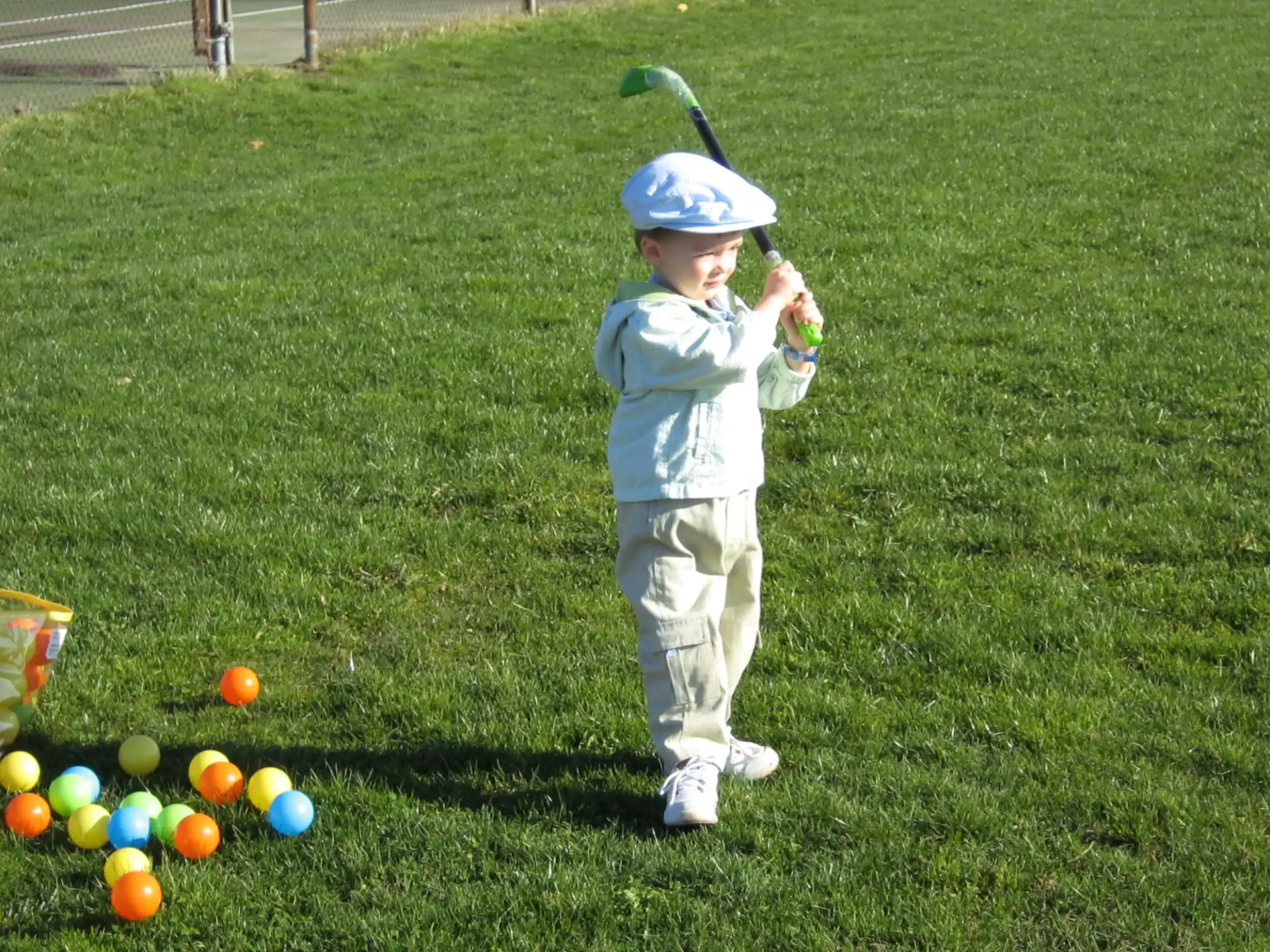 a kid playing tee ball