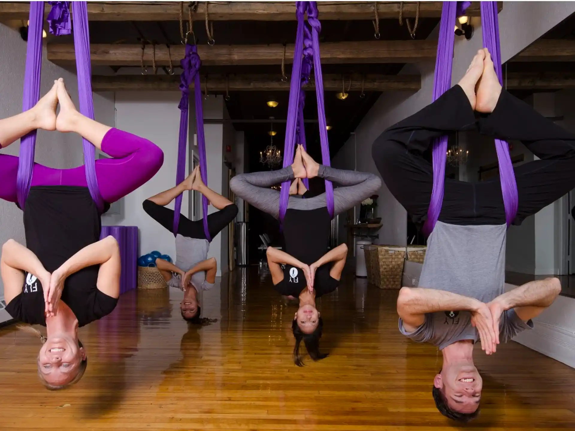 a group of people doing yoga