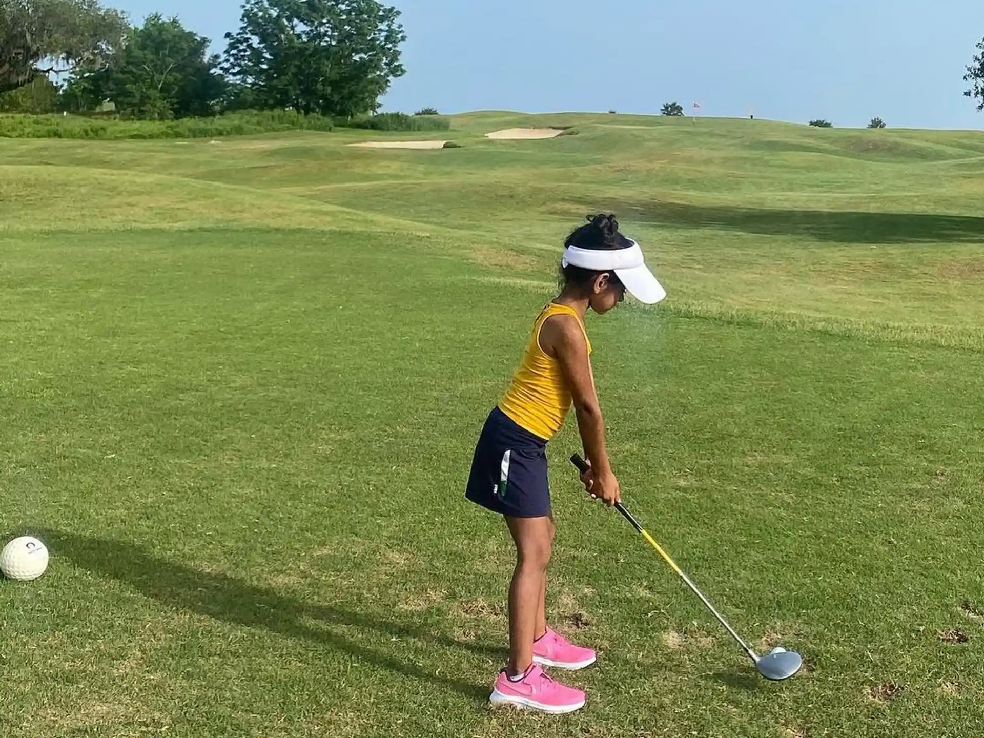 a person playing golf