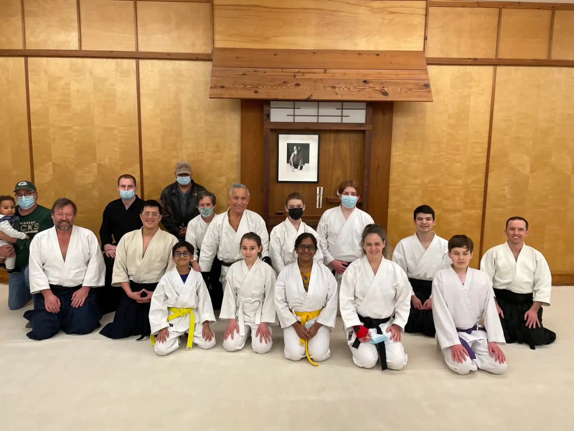 a group of people posing for a photo