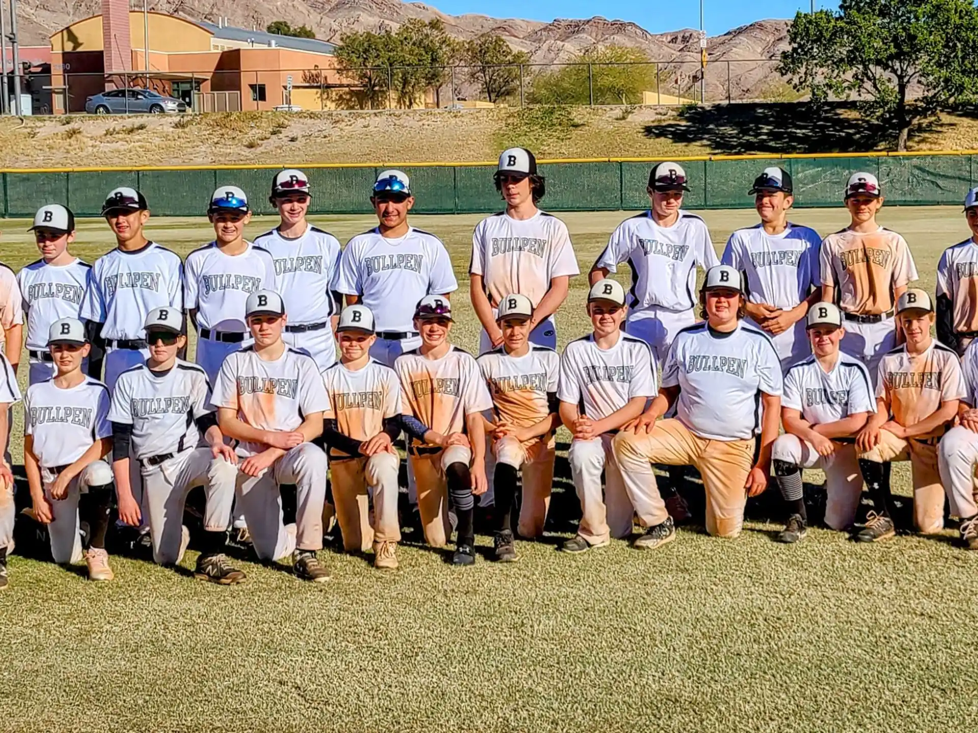 a group of baseball players posing for a photo
