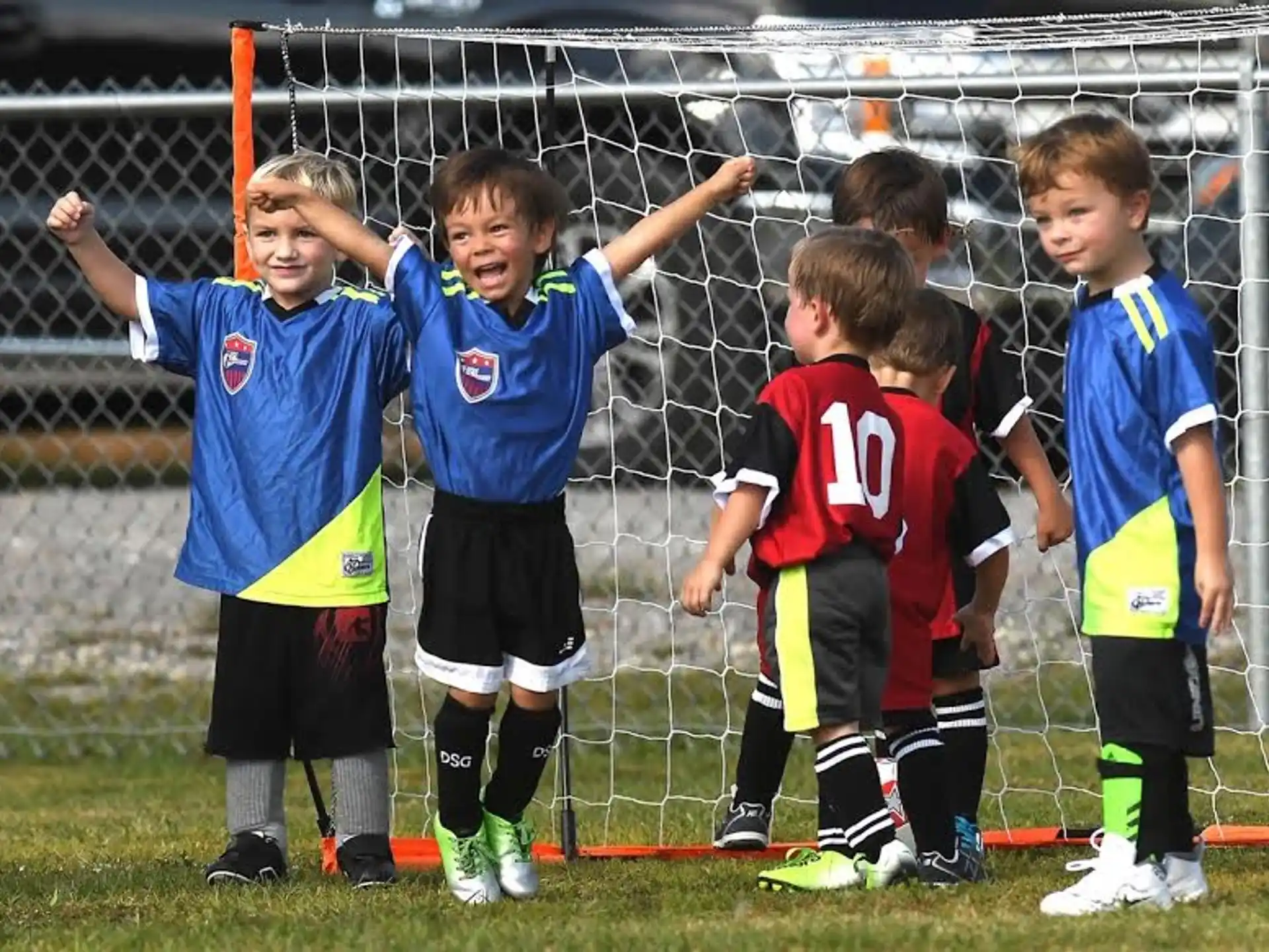 a group of boys in football uniforms