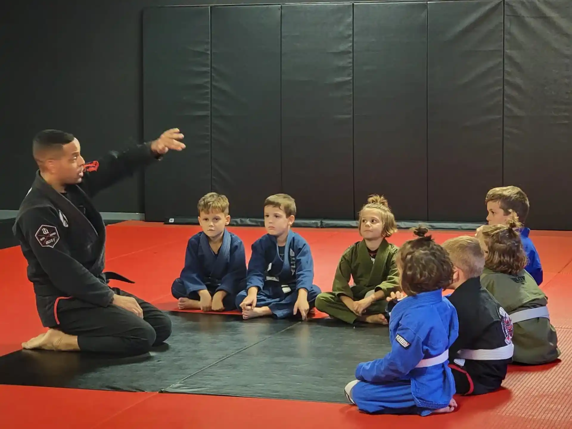 a person teaching a group of children