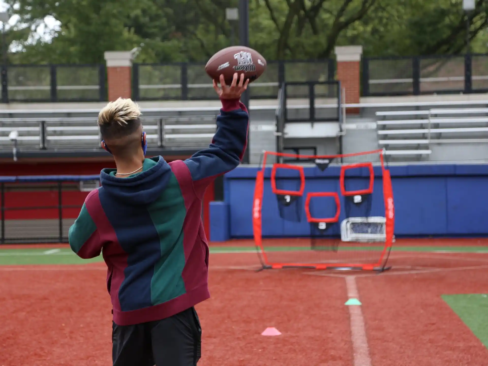 a boy throwing a ball