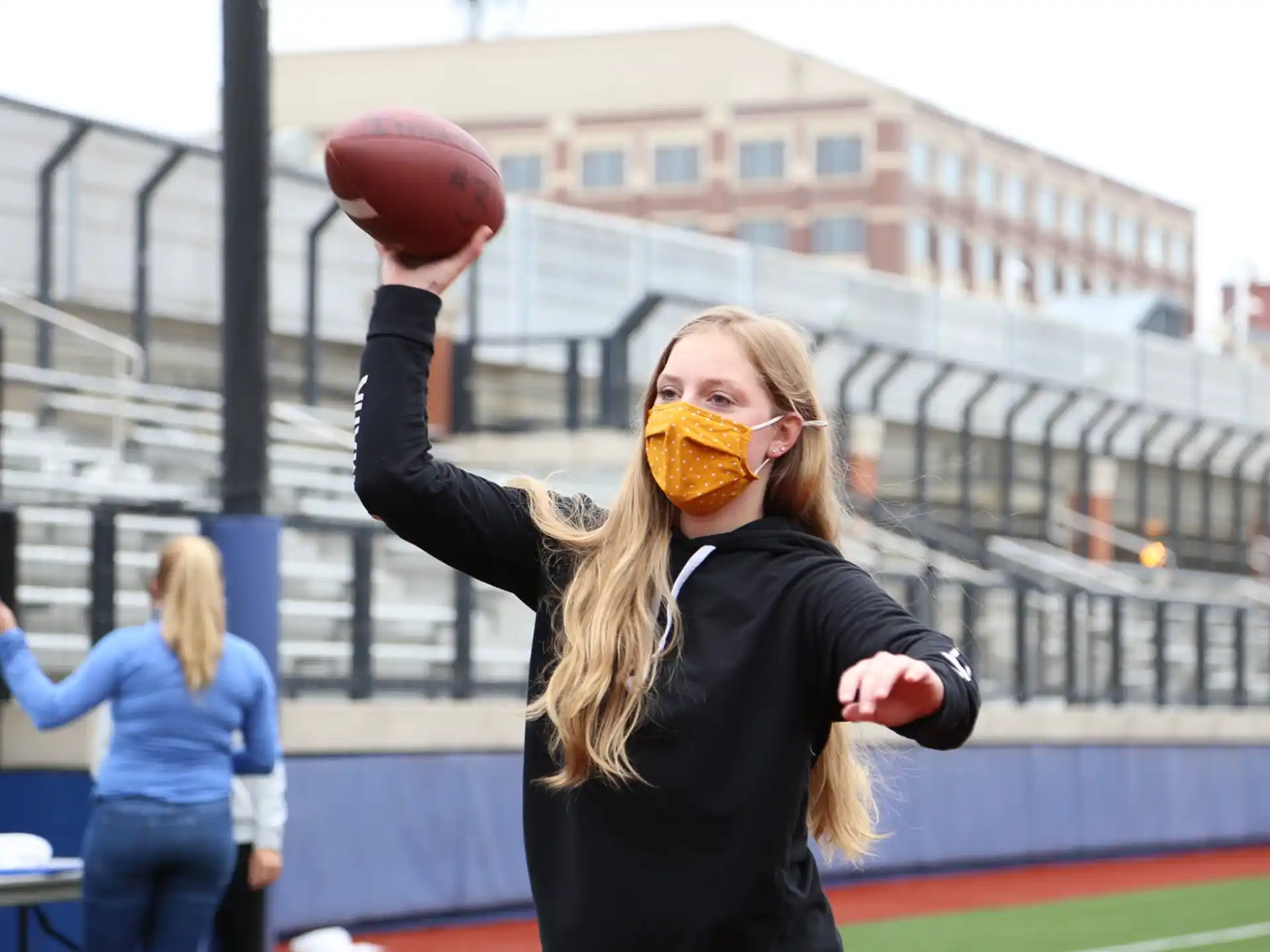 a person throwing a football