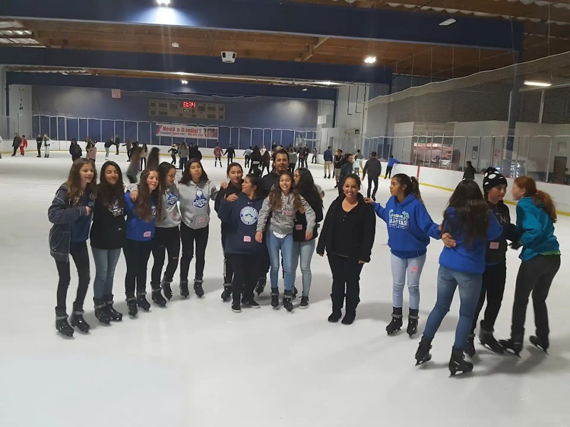 a group of people on an ice rink