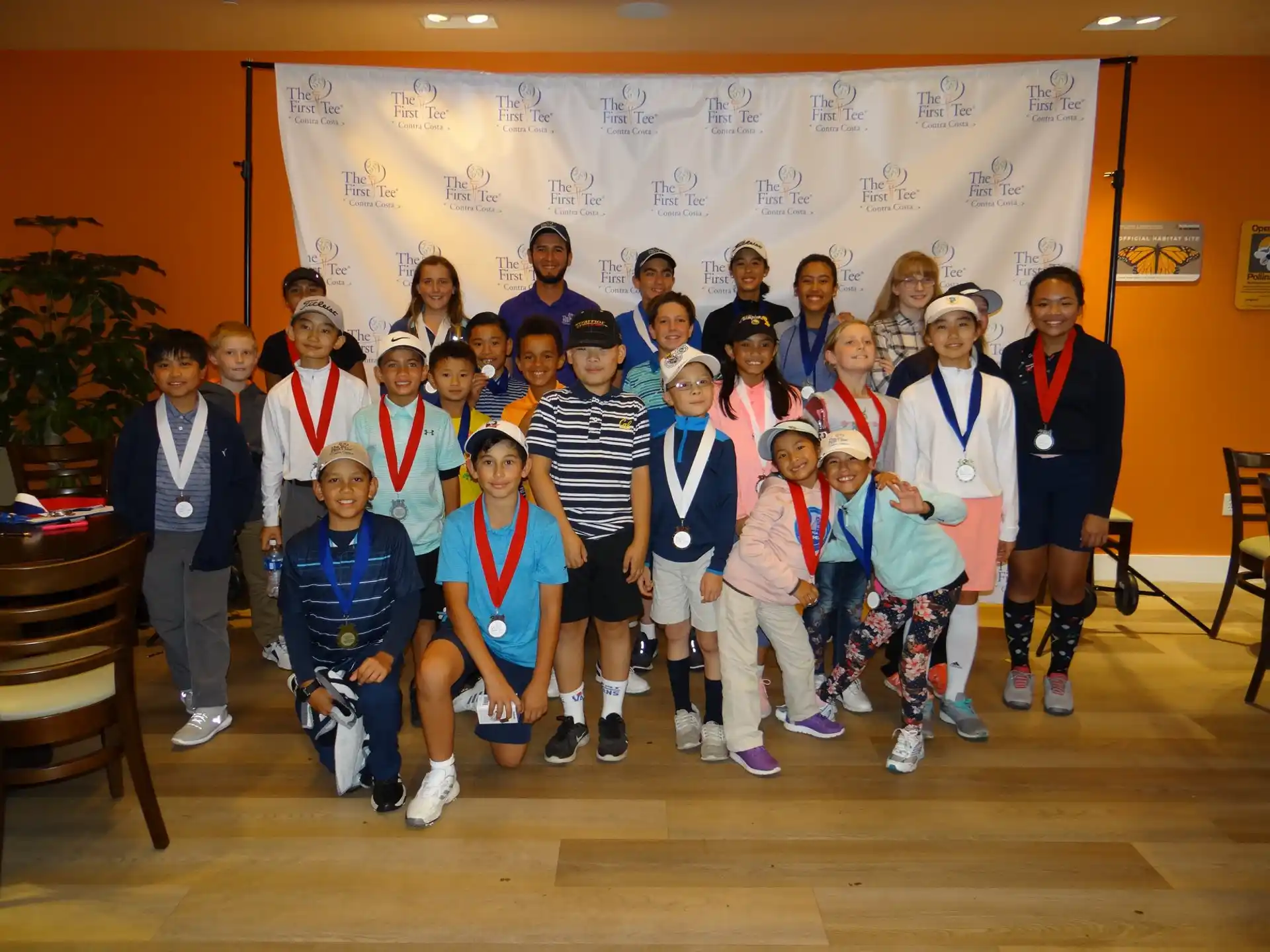 a group of people posing for a photo