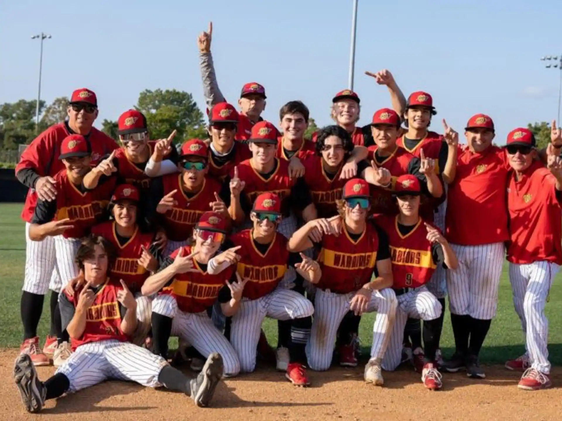 a group of baseball players posing for a photo