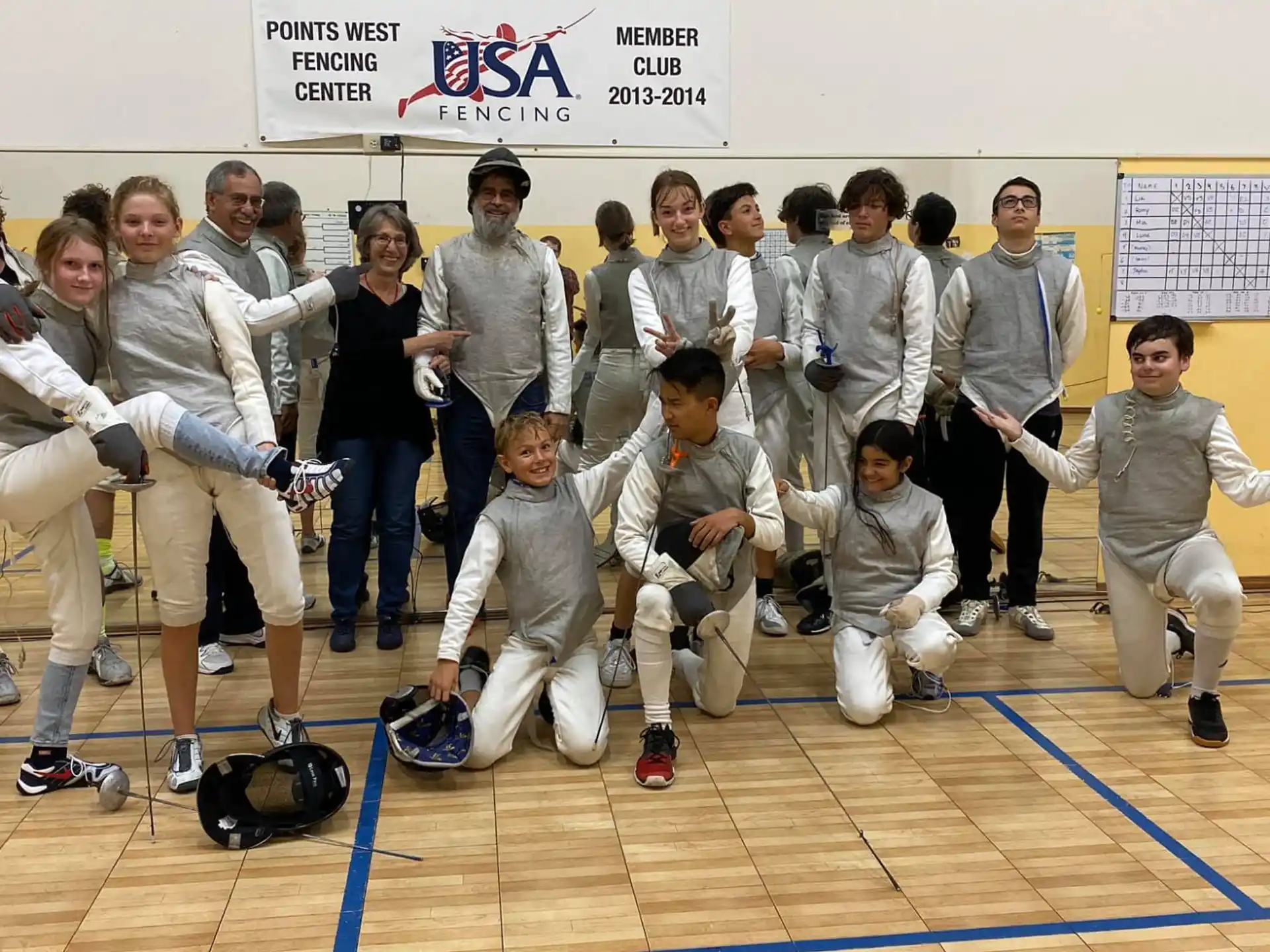 a group of people in white uniforms