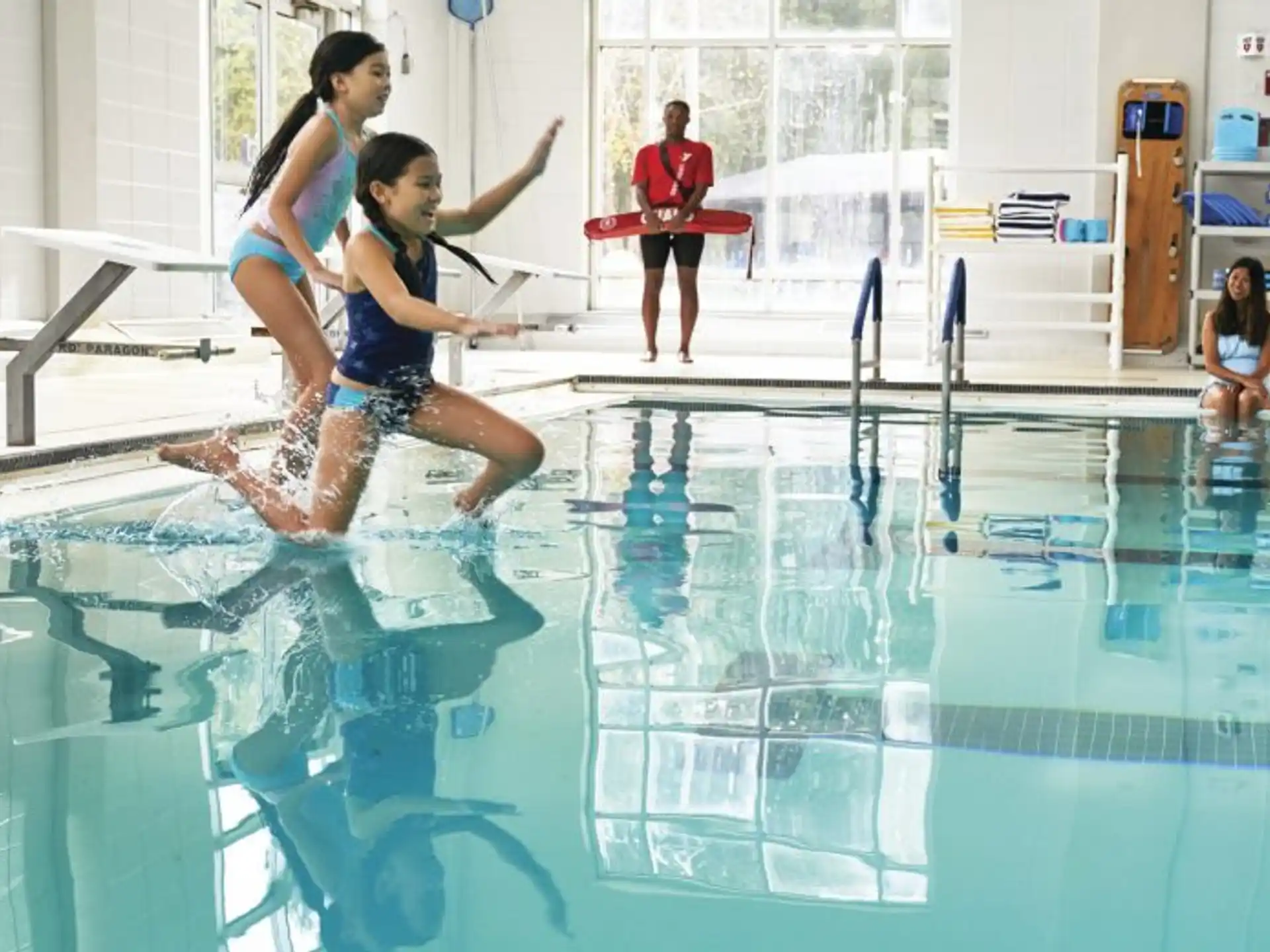 a group of people in a swimming pool
