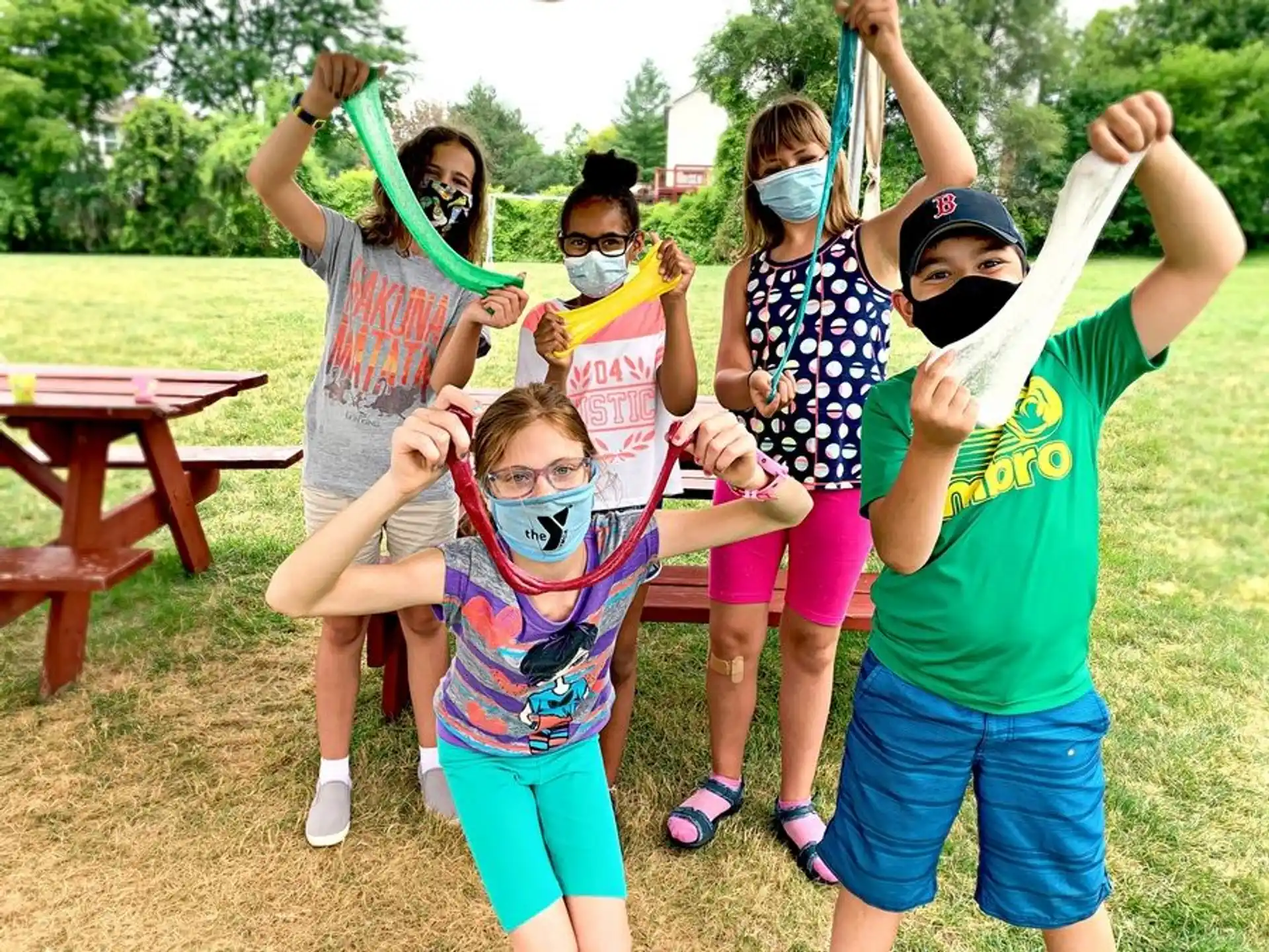 a group of people wearing masks