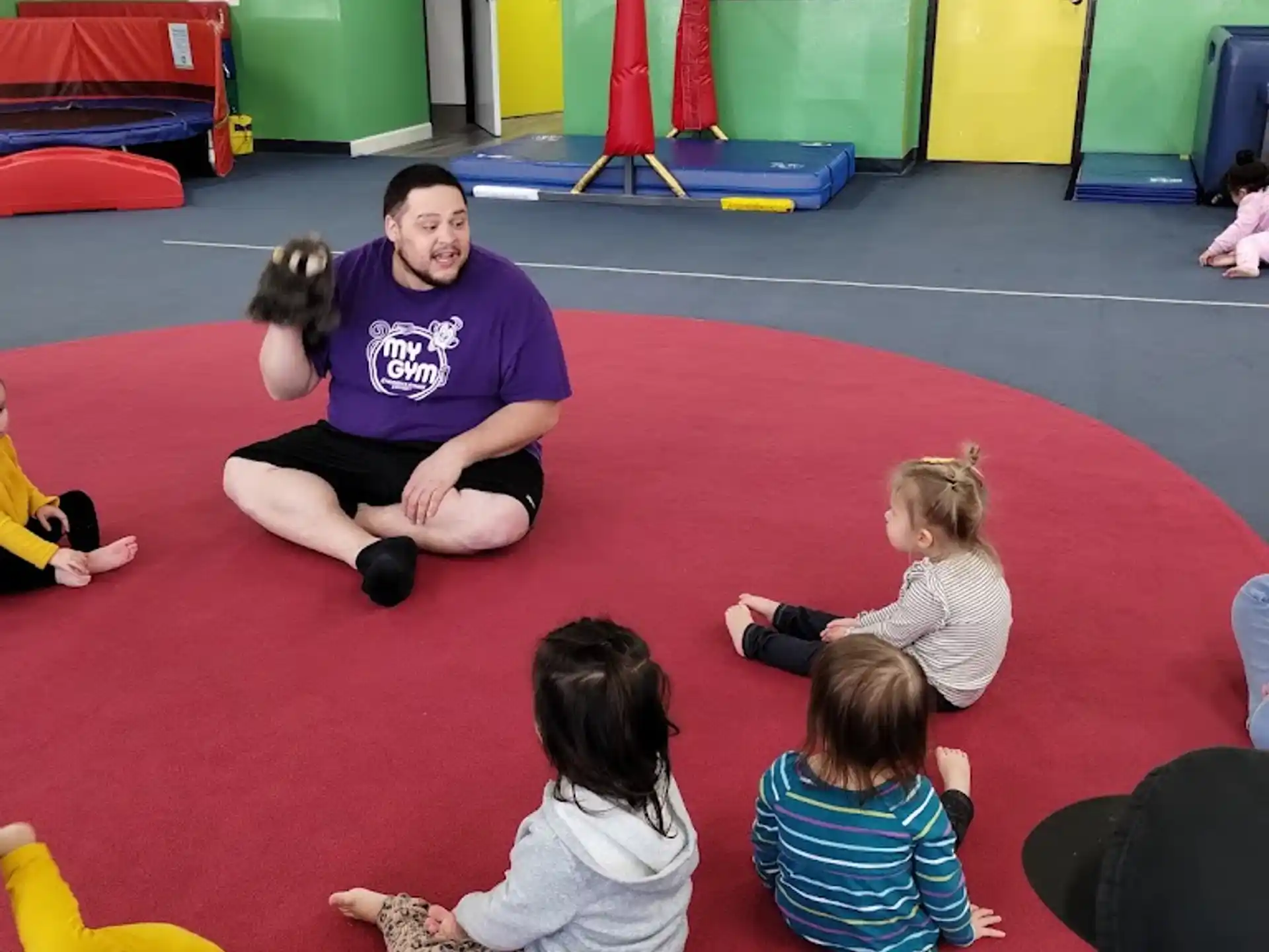 a group of people sitting on the floor