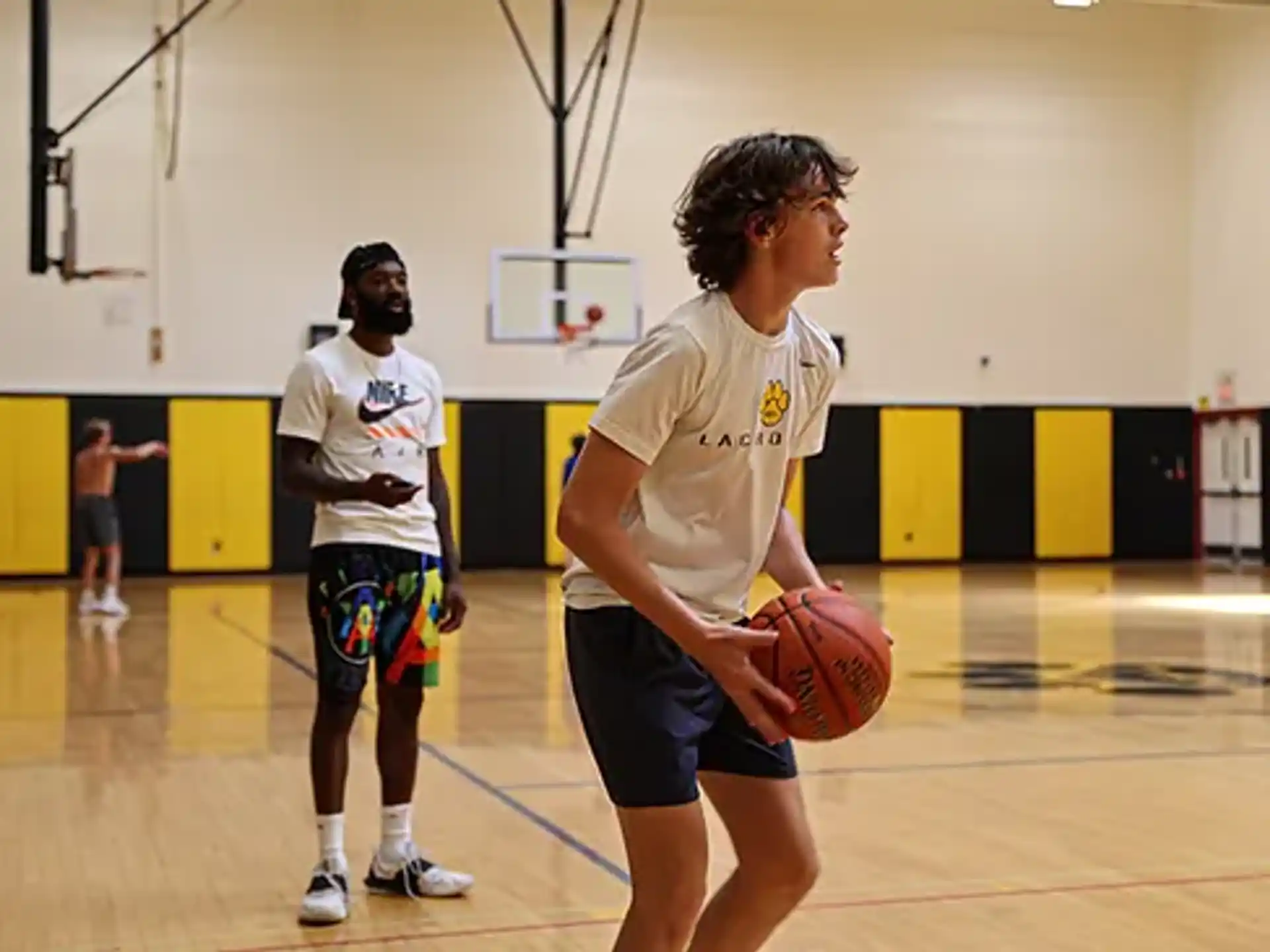 a person holding a basketball