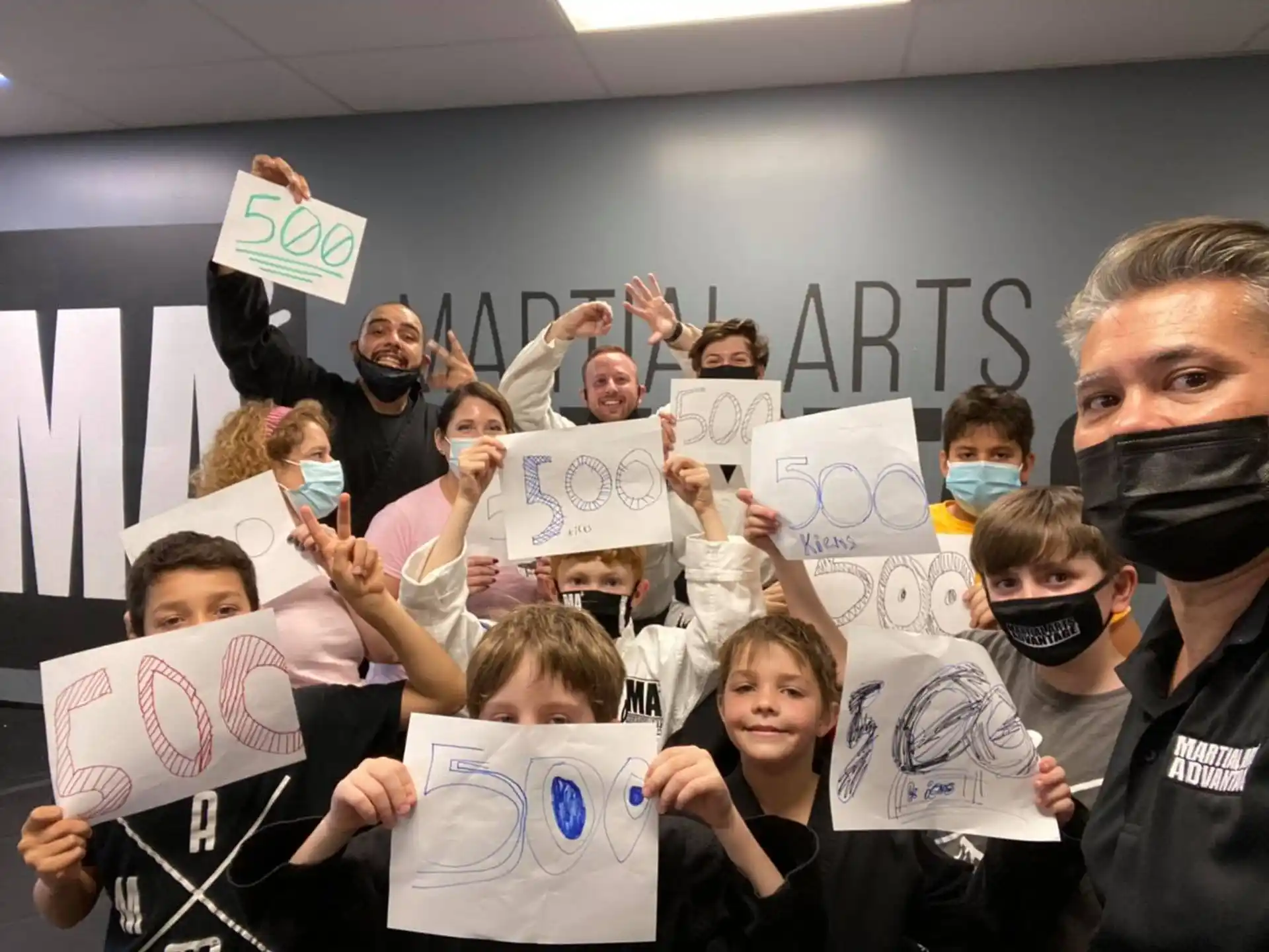 a group of people holding signs