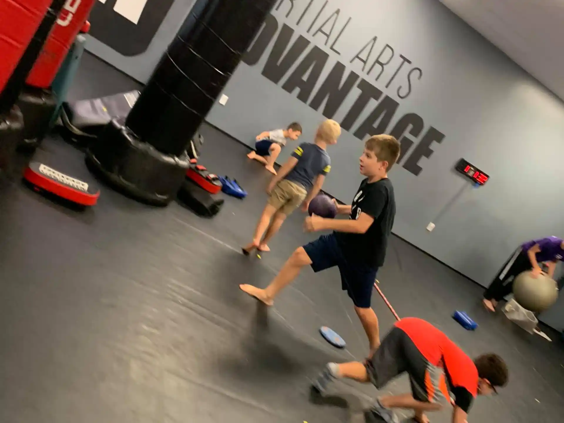a group of people working out in a gym