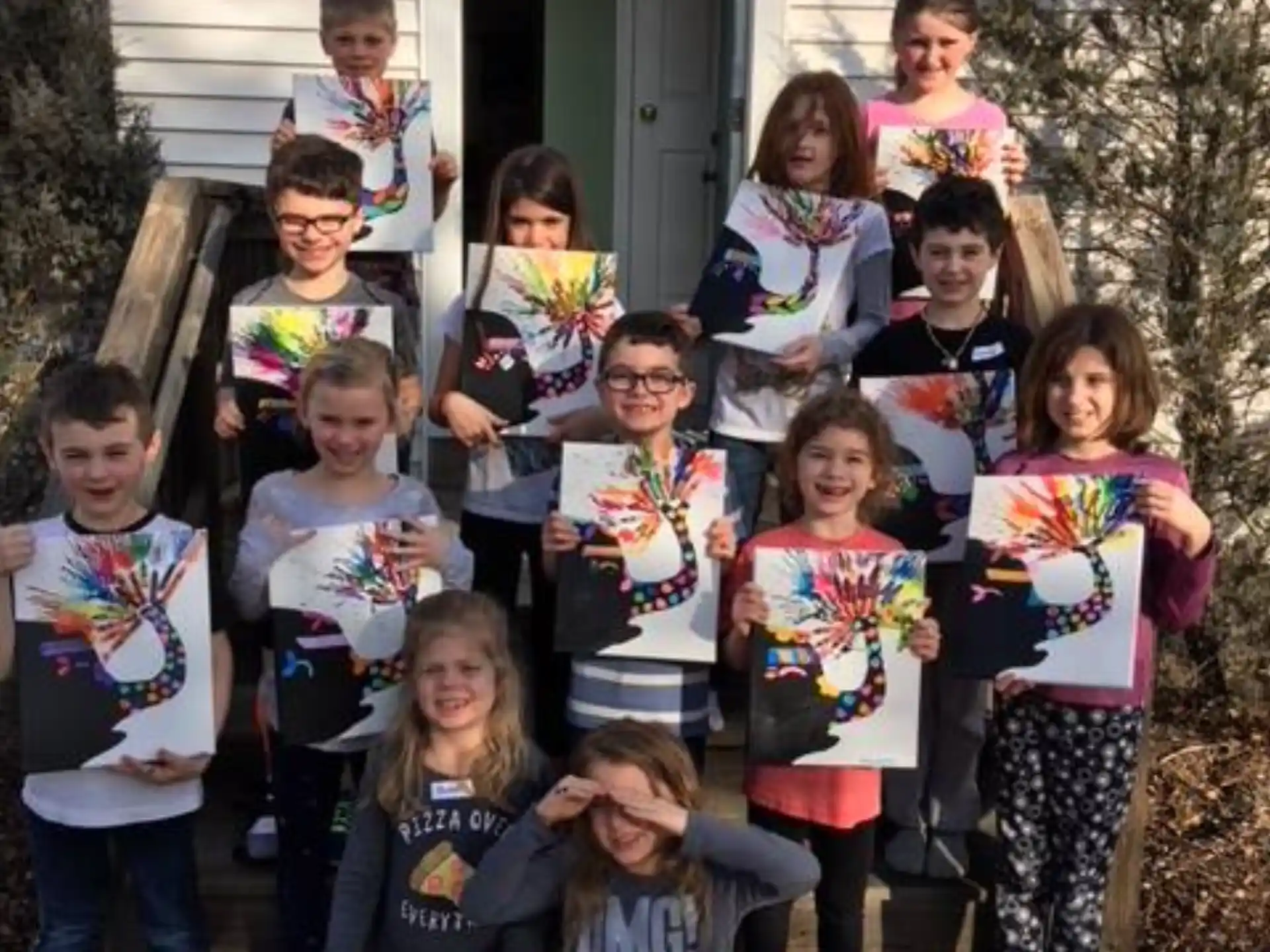 a group of children posing for a photo