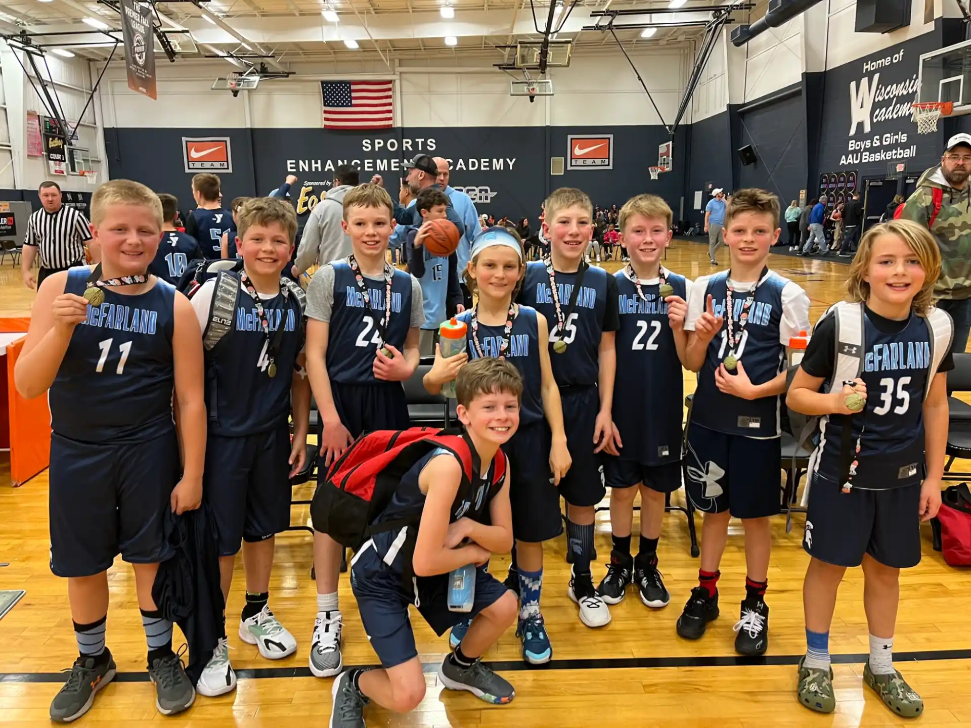a group of people in sports uniforms