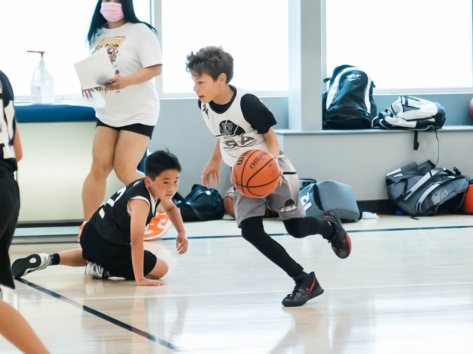 a boy playing basketball