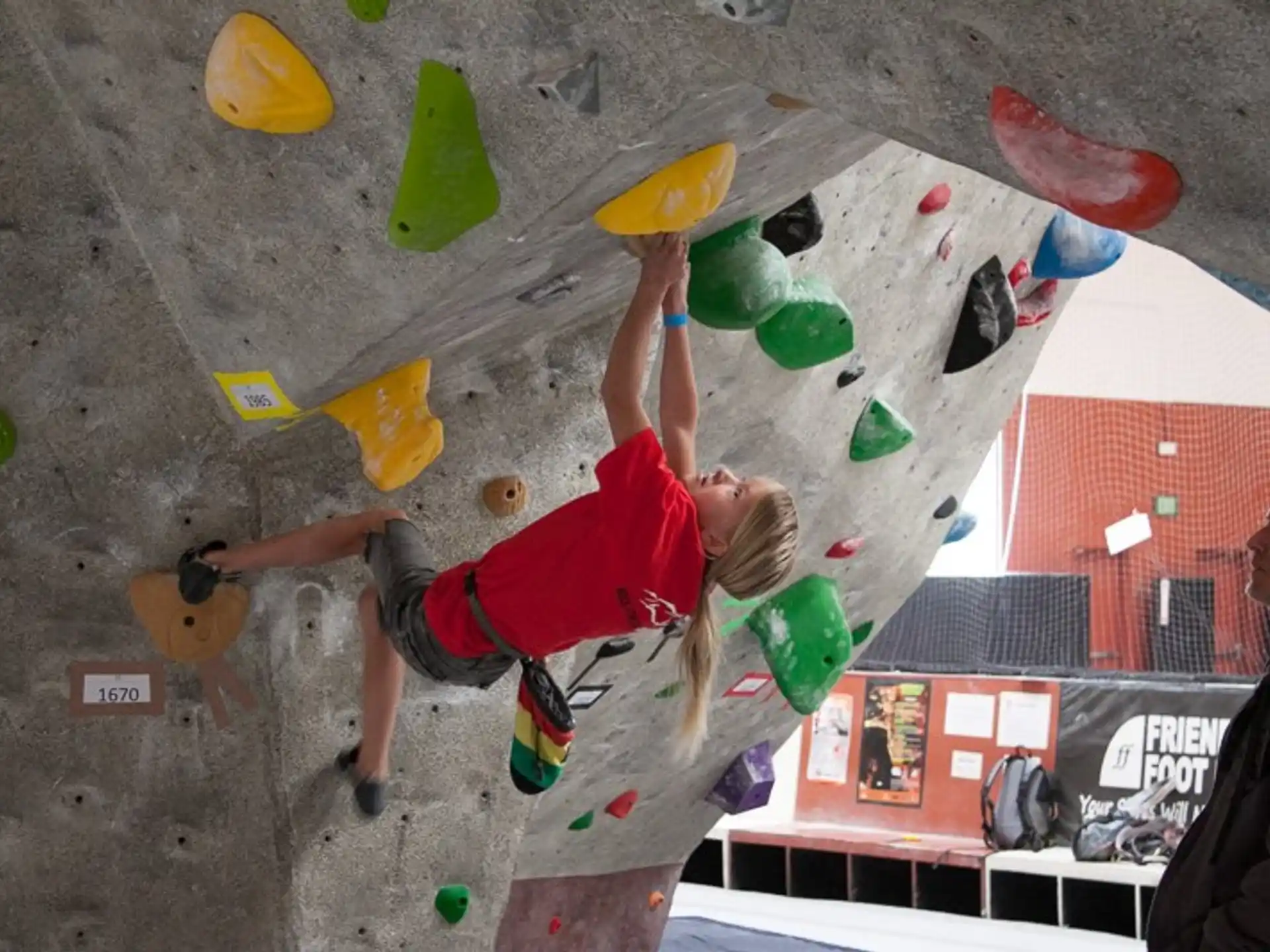 a person climbing a rock wall