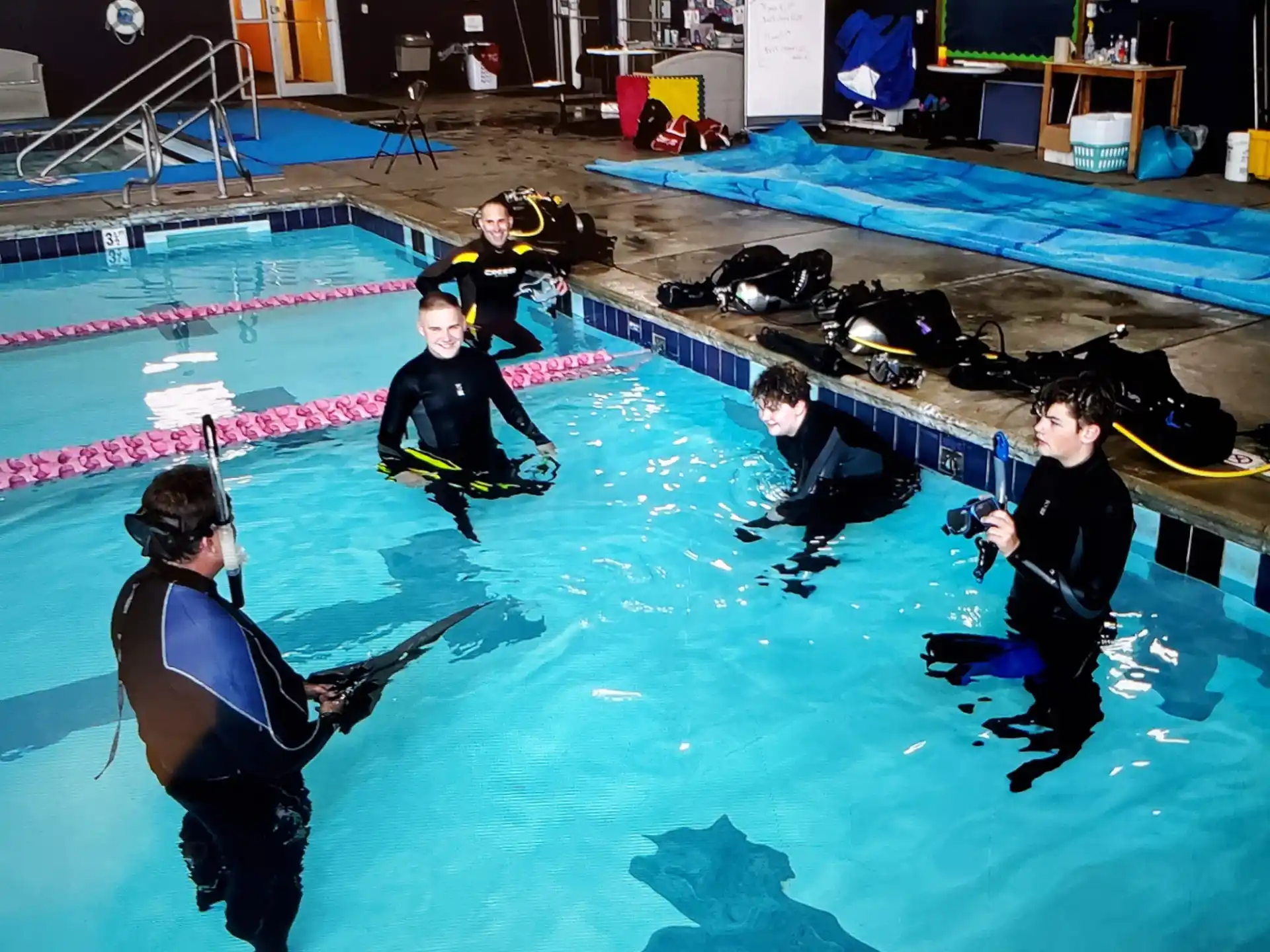 a group of people in a pool