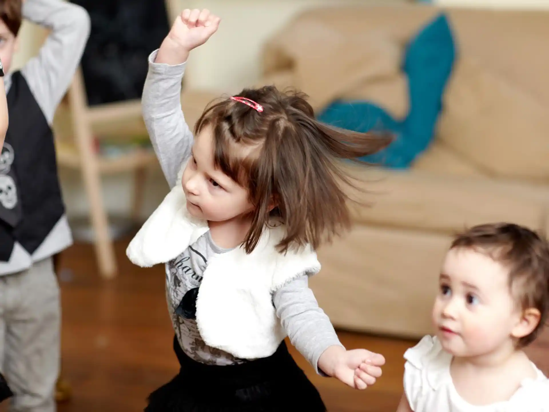 a girl with her arms up