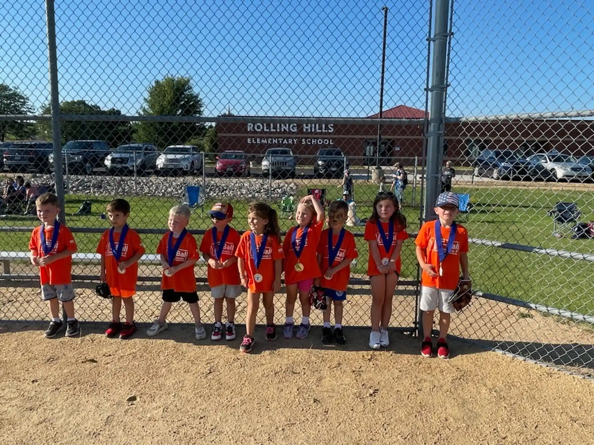 a group of kids posing for a photo