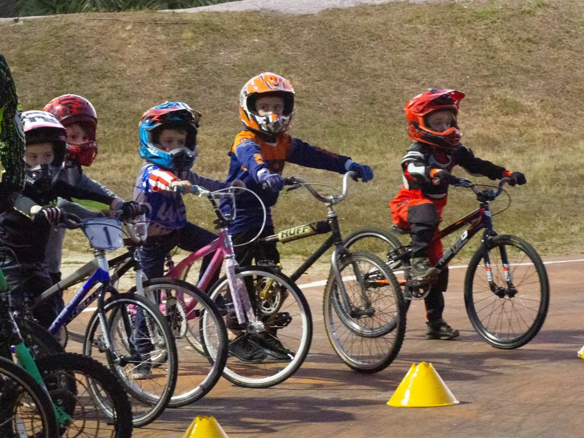 a group of kids on bicycles