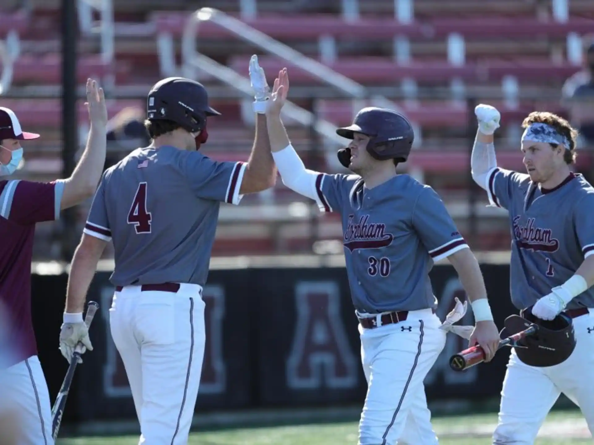 a group of baseball players celebrating