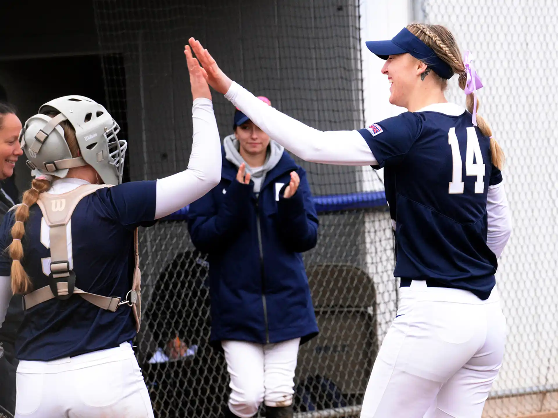 a group of people in sports uniforms