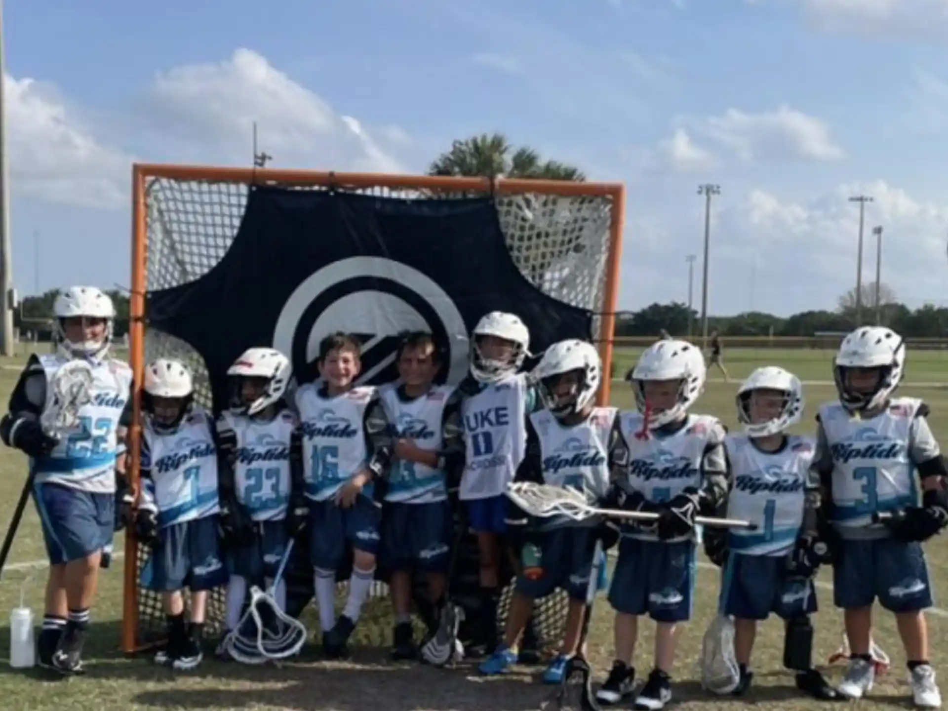 a group of kids wearing helmets
