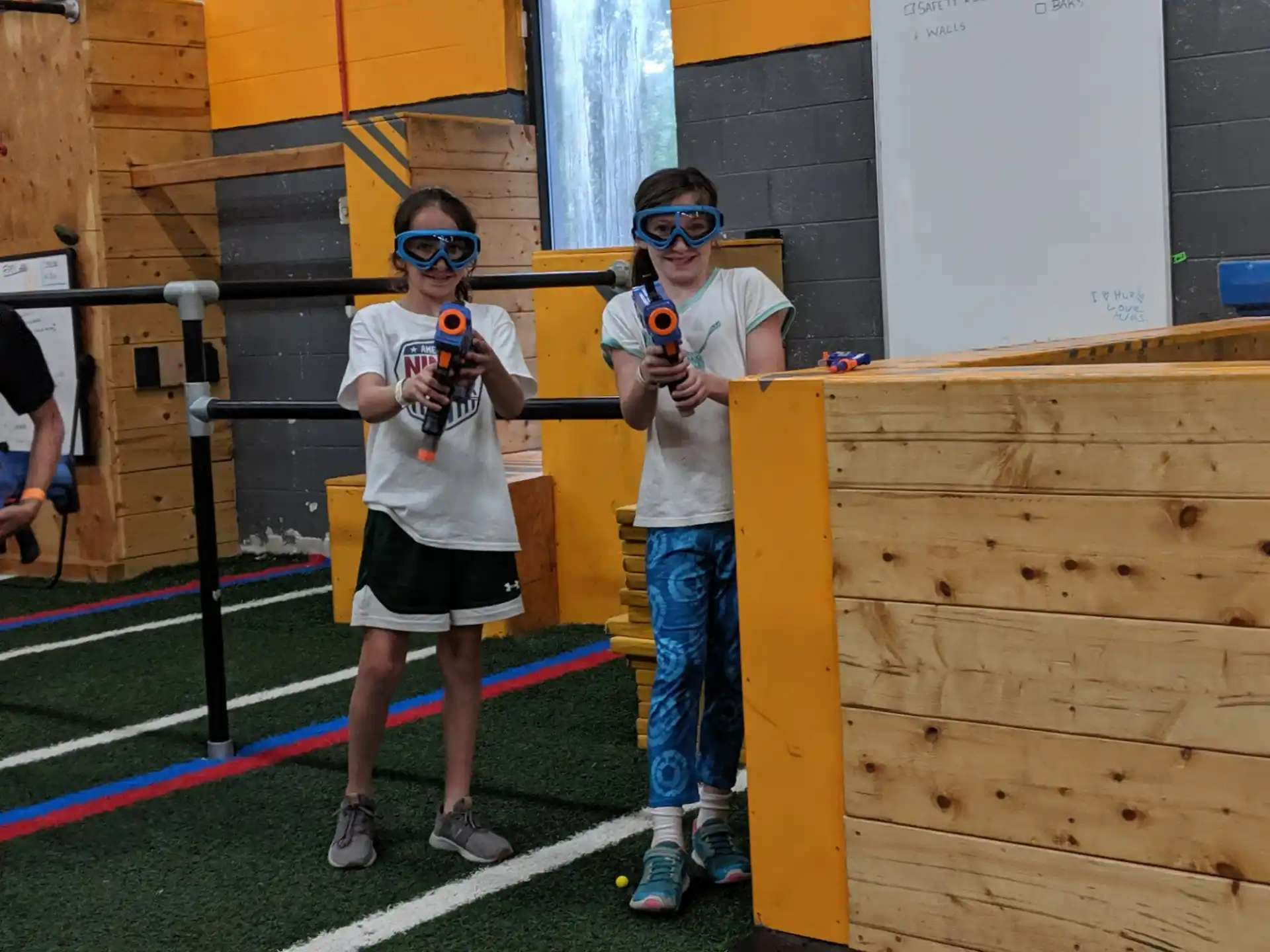 a couple of boys wearing goggles