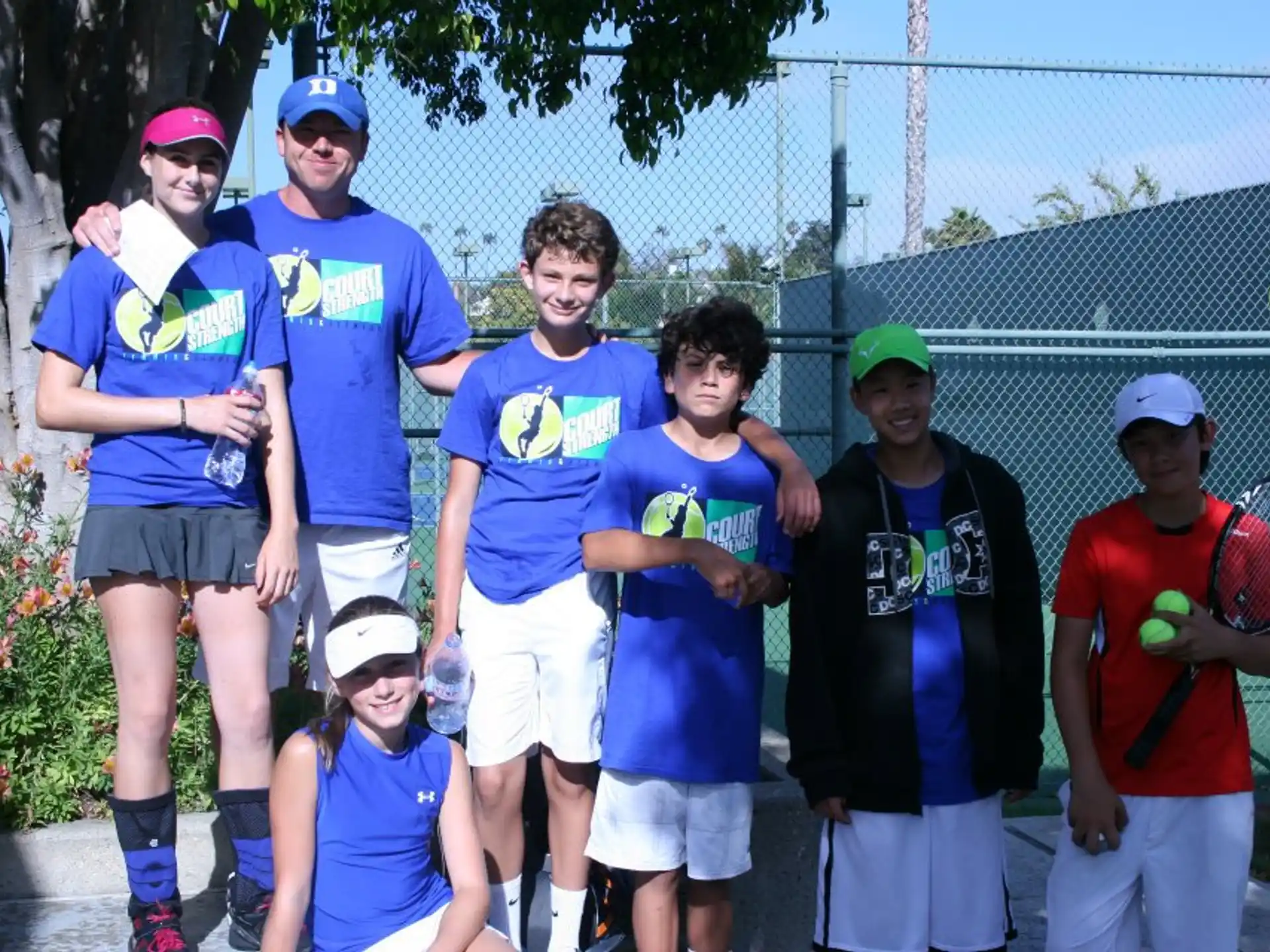 a group of people pose for a photo
