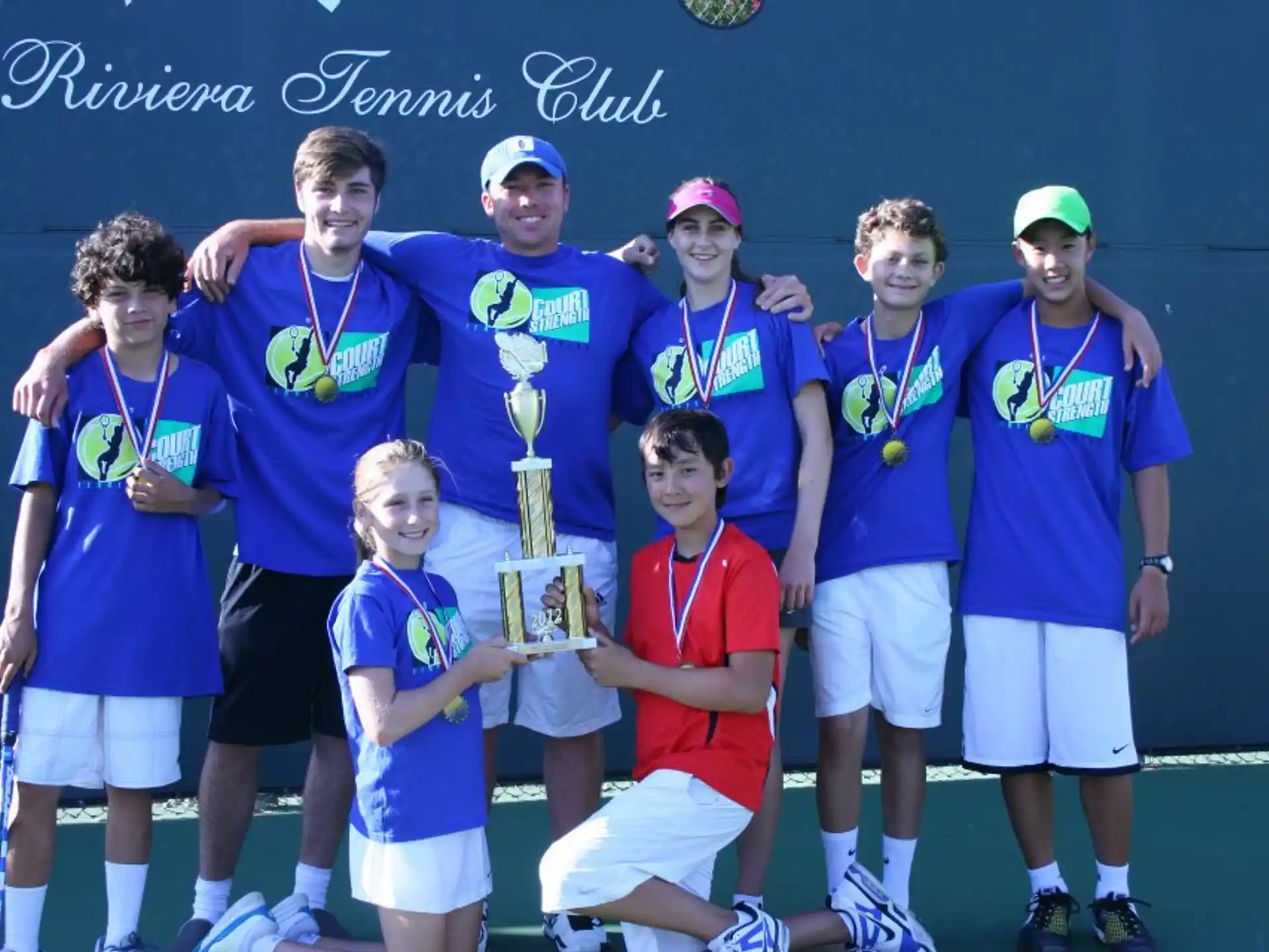 a group of people posing for a photo