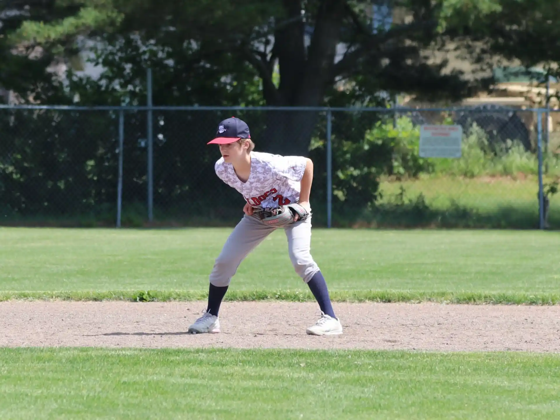 a baseball player pitching a ball