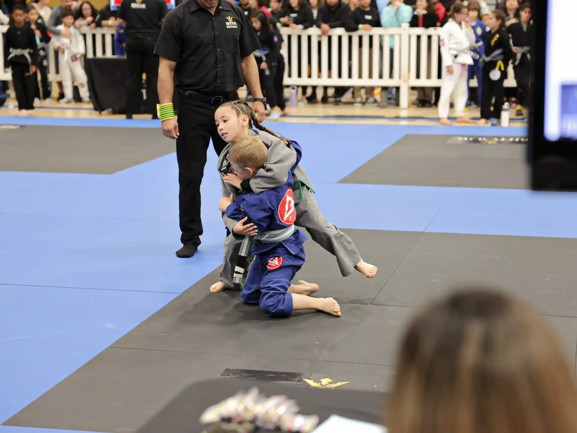 a group of children in a karate class