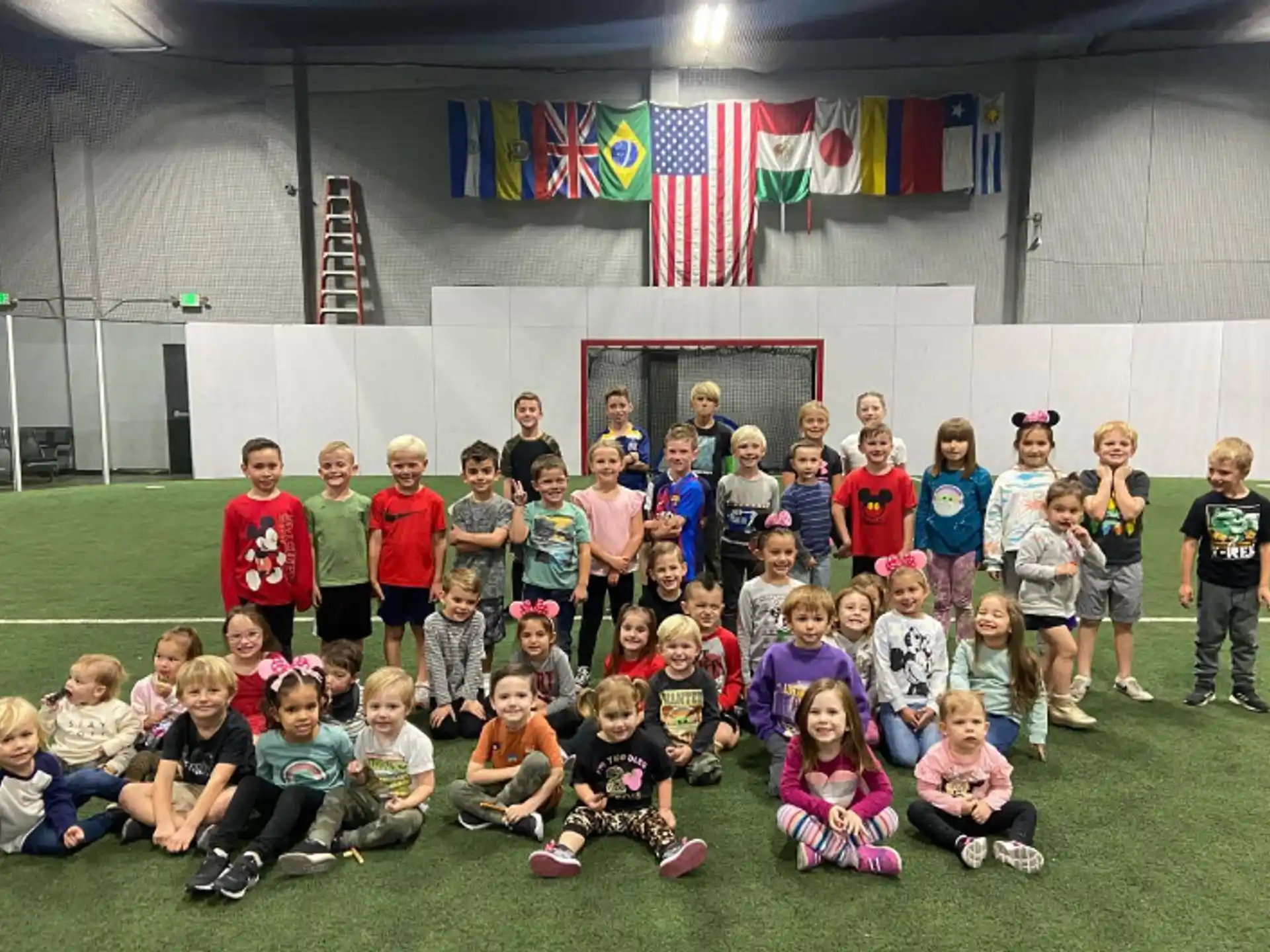 a group of children posing for a photo