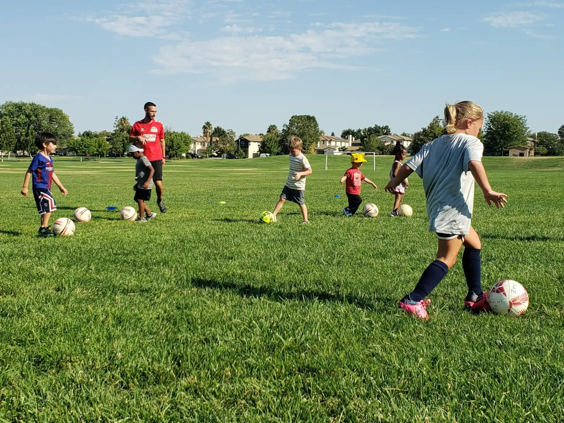 a group of kids playing football