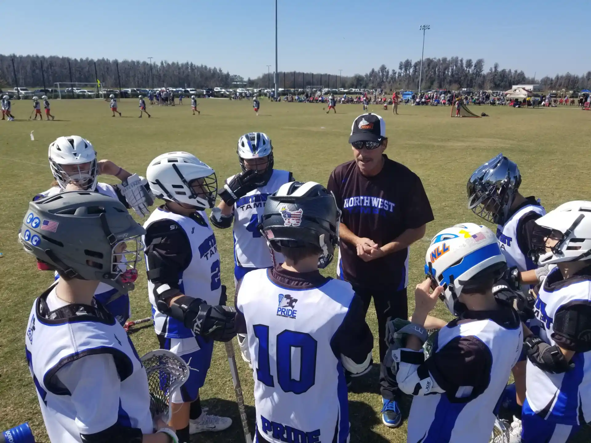 a football coach talking to his team