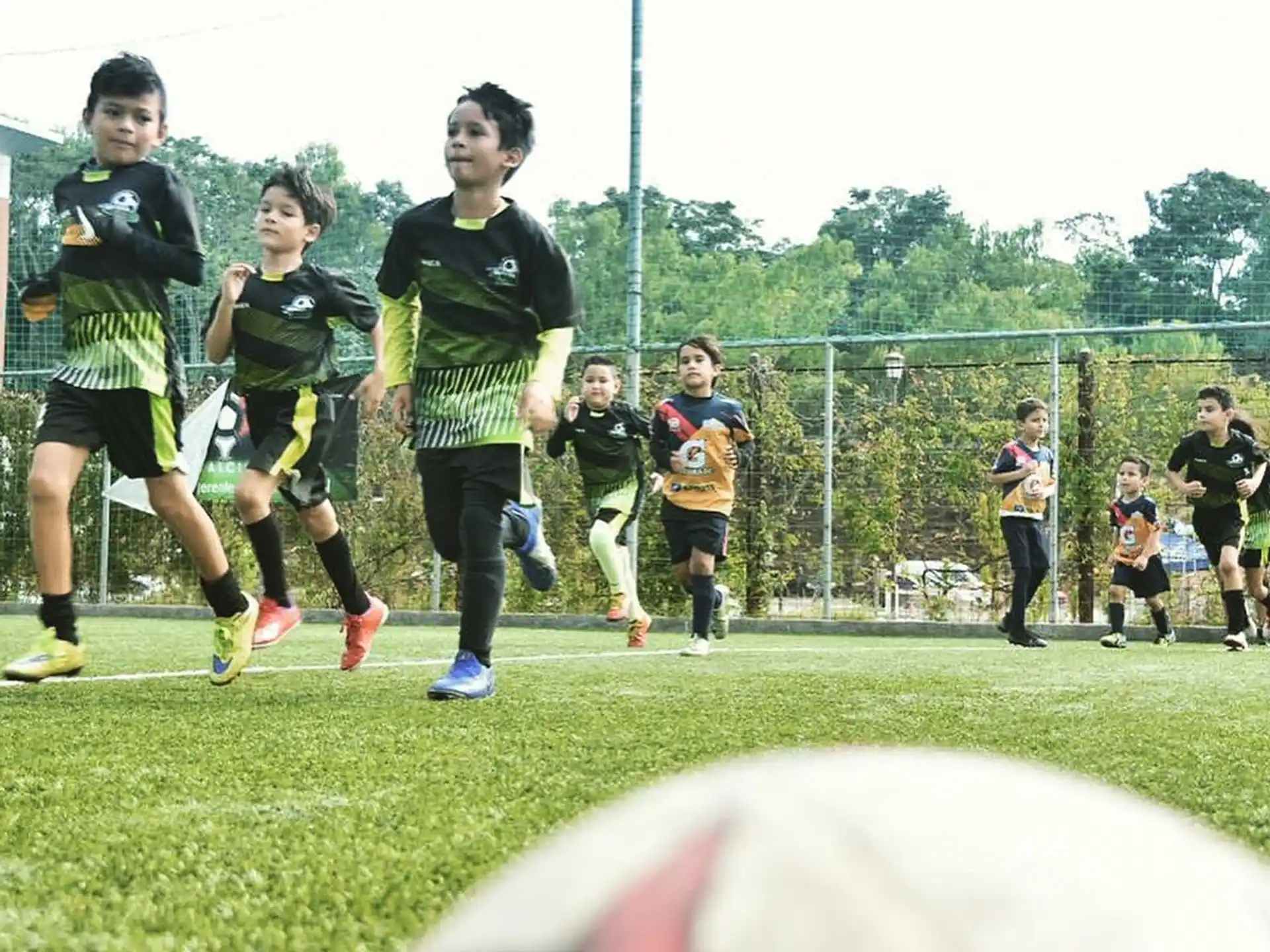 a group of people playing football